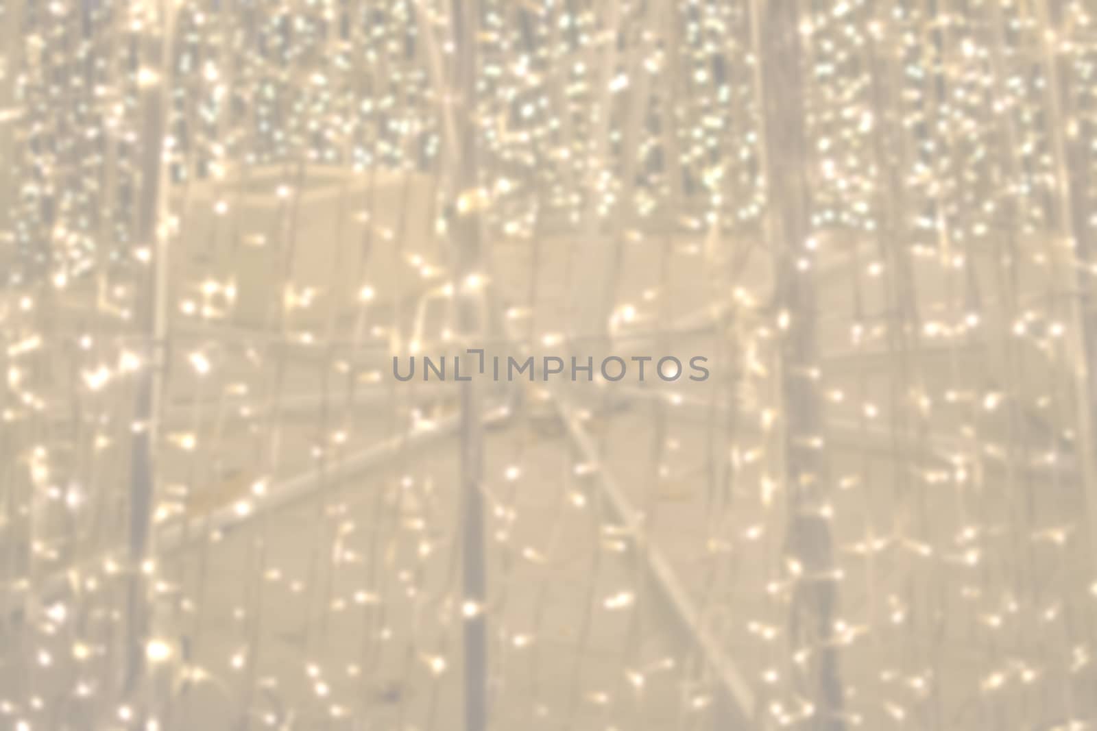 Abstract golden background texture with string lights New Years Eve backdrop