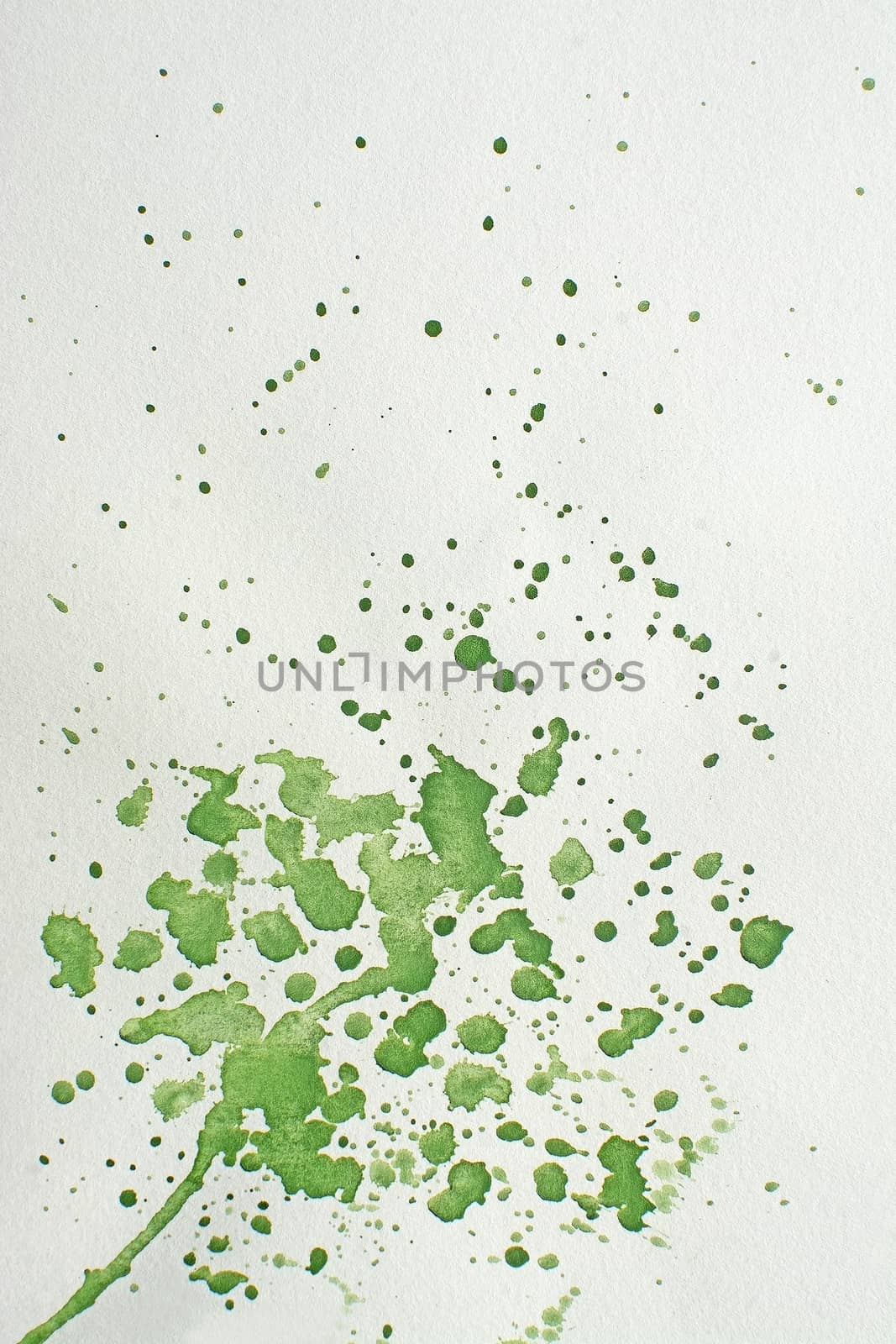 Green wet splatter watercolor background texture fresh flow drops and strokes on paper.