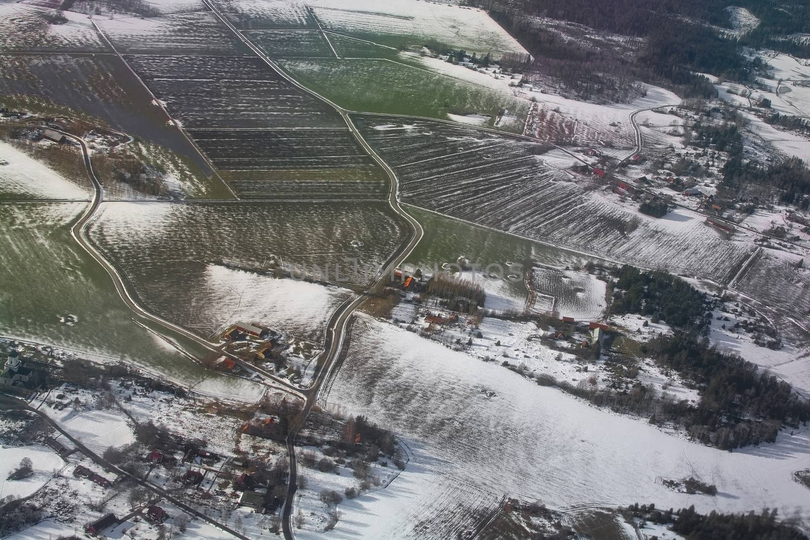 Aerial landscape snowy winter view of farmland  by ArtesiaWells