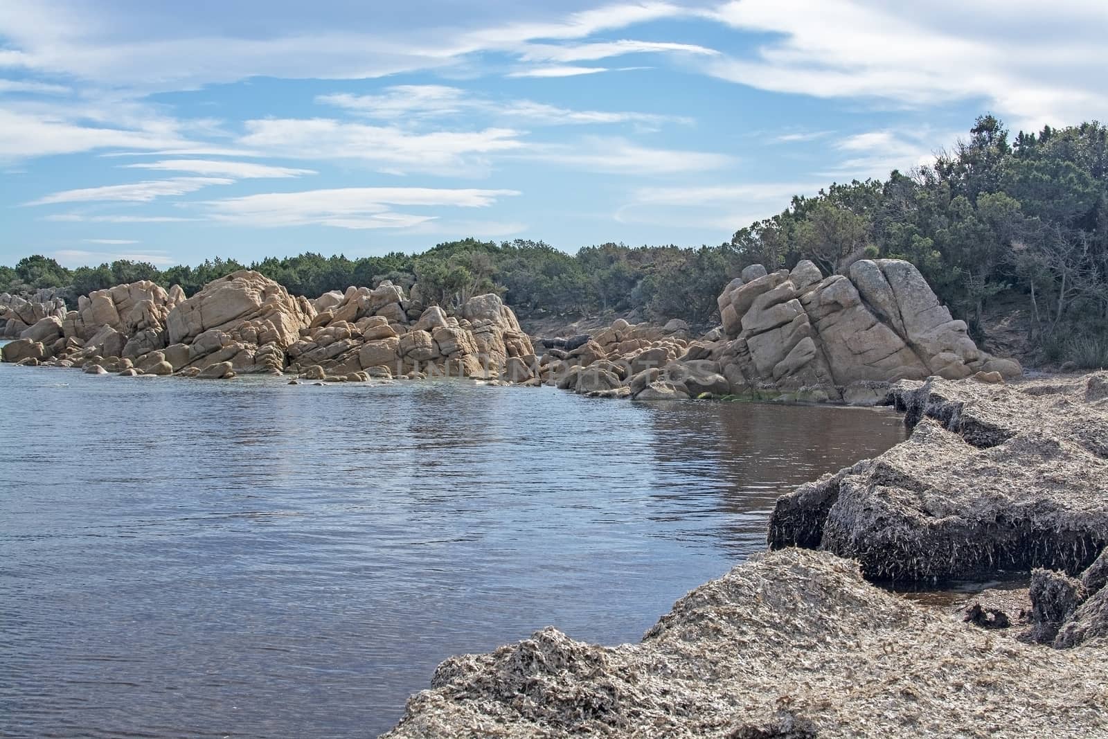 Beach with granite rocks in Costa Smeralda Sardinia by ArtesiaWells