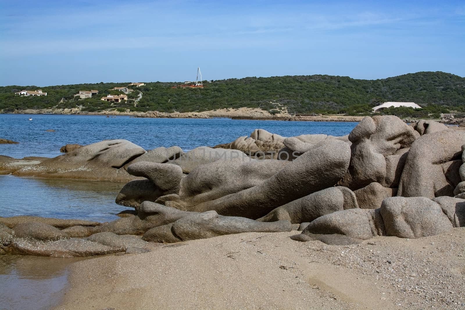 Beach with granite rocks in Costa Smeralda Sardinia by ArtesiaWells