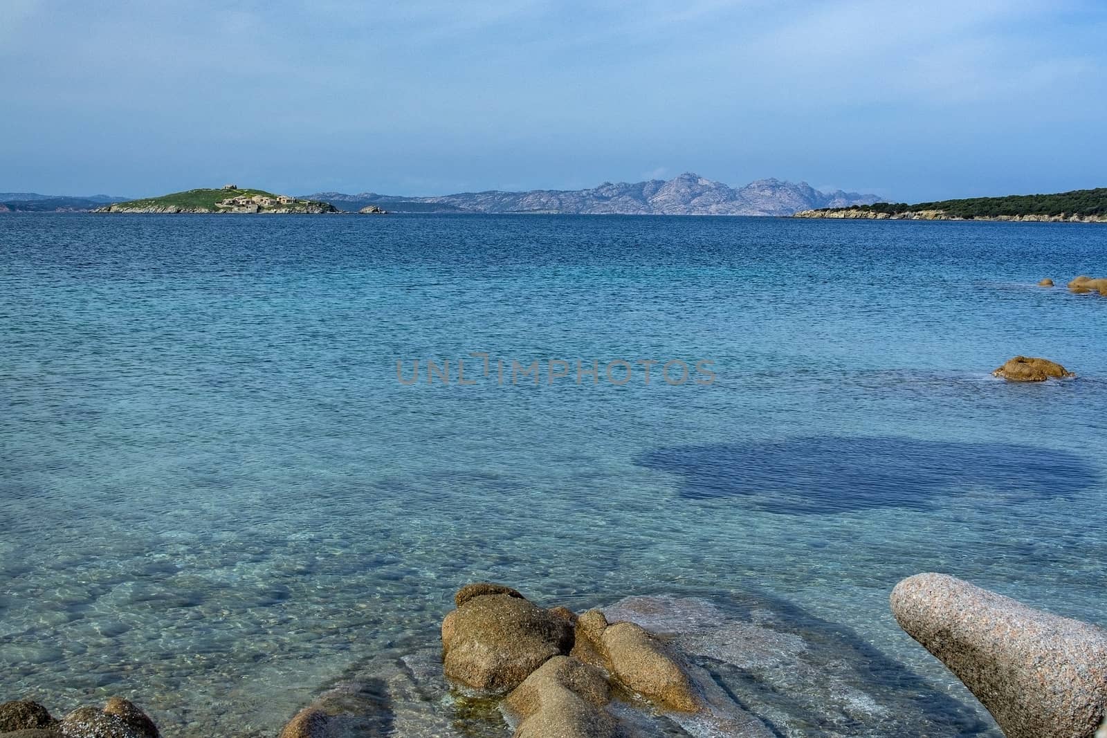 Beach with granite rocks in Costa Smeralda Sardinia by ArtesiaWells