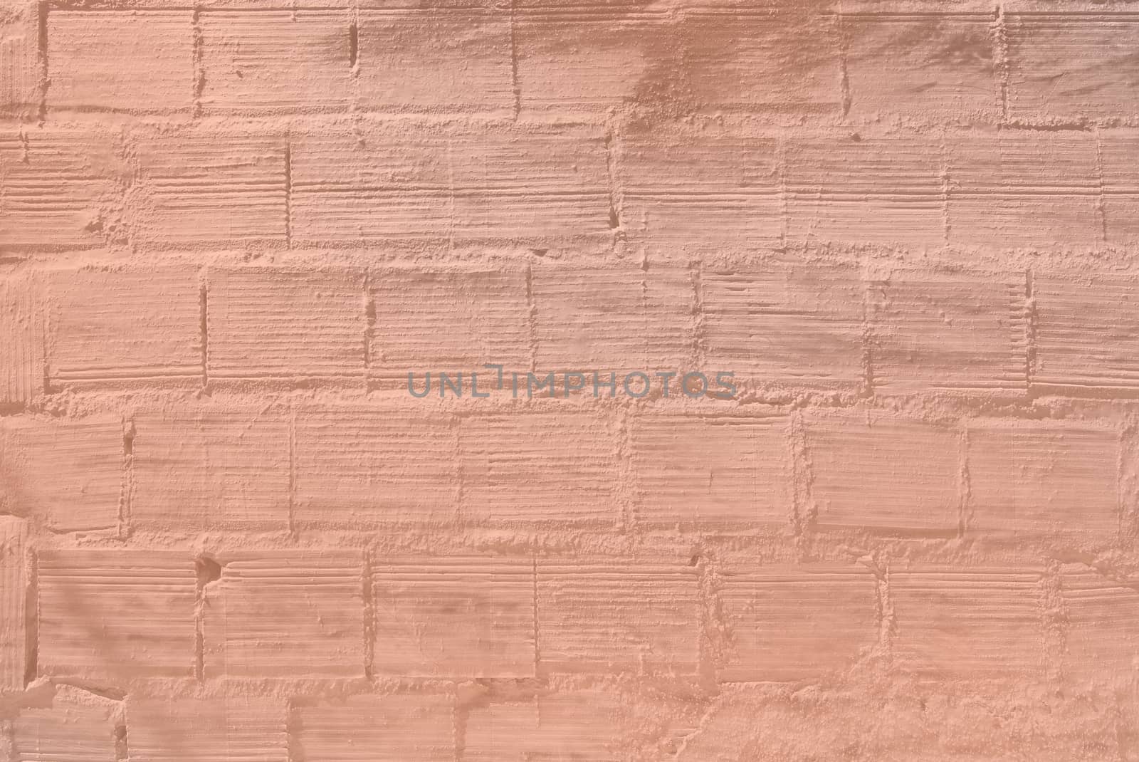 Roughcast on brick wall pattern texture background toned in color Living Coral