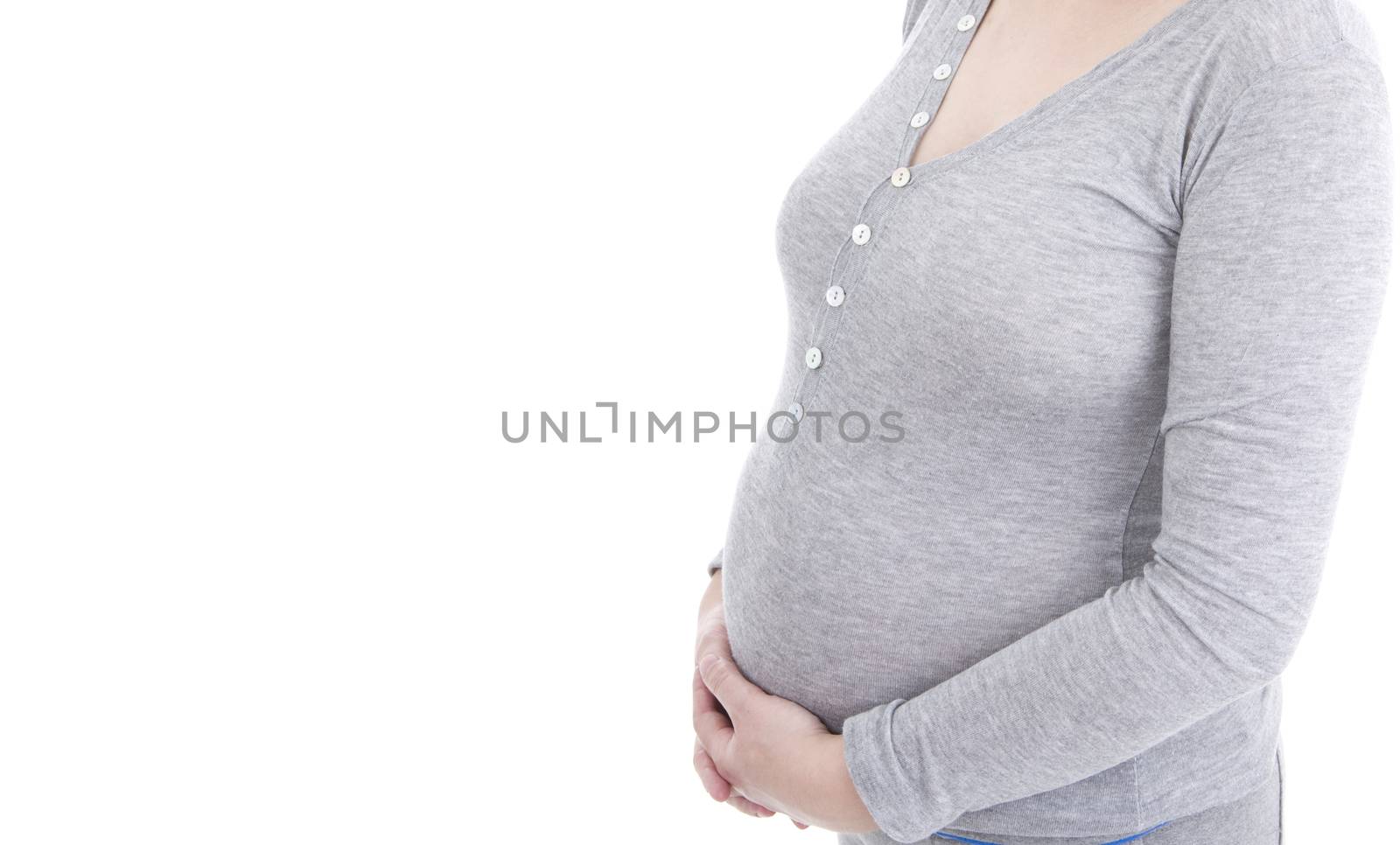 Closeup of pregnant woman at white background