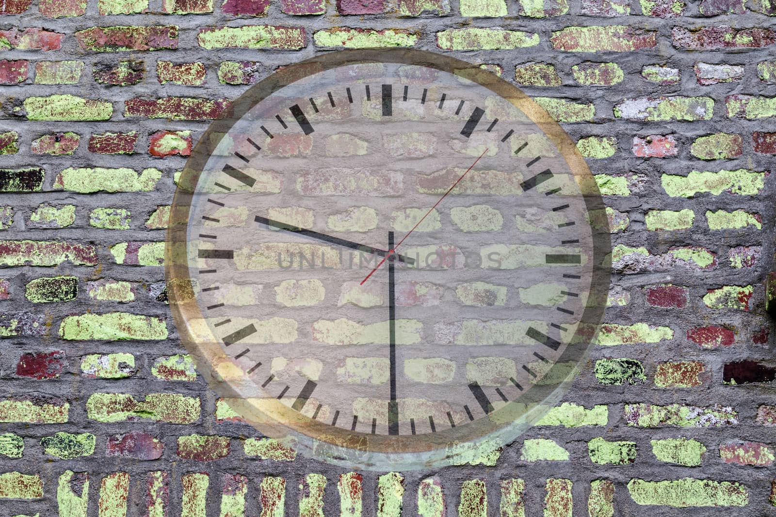 Big clock in front of an old brick wall