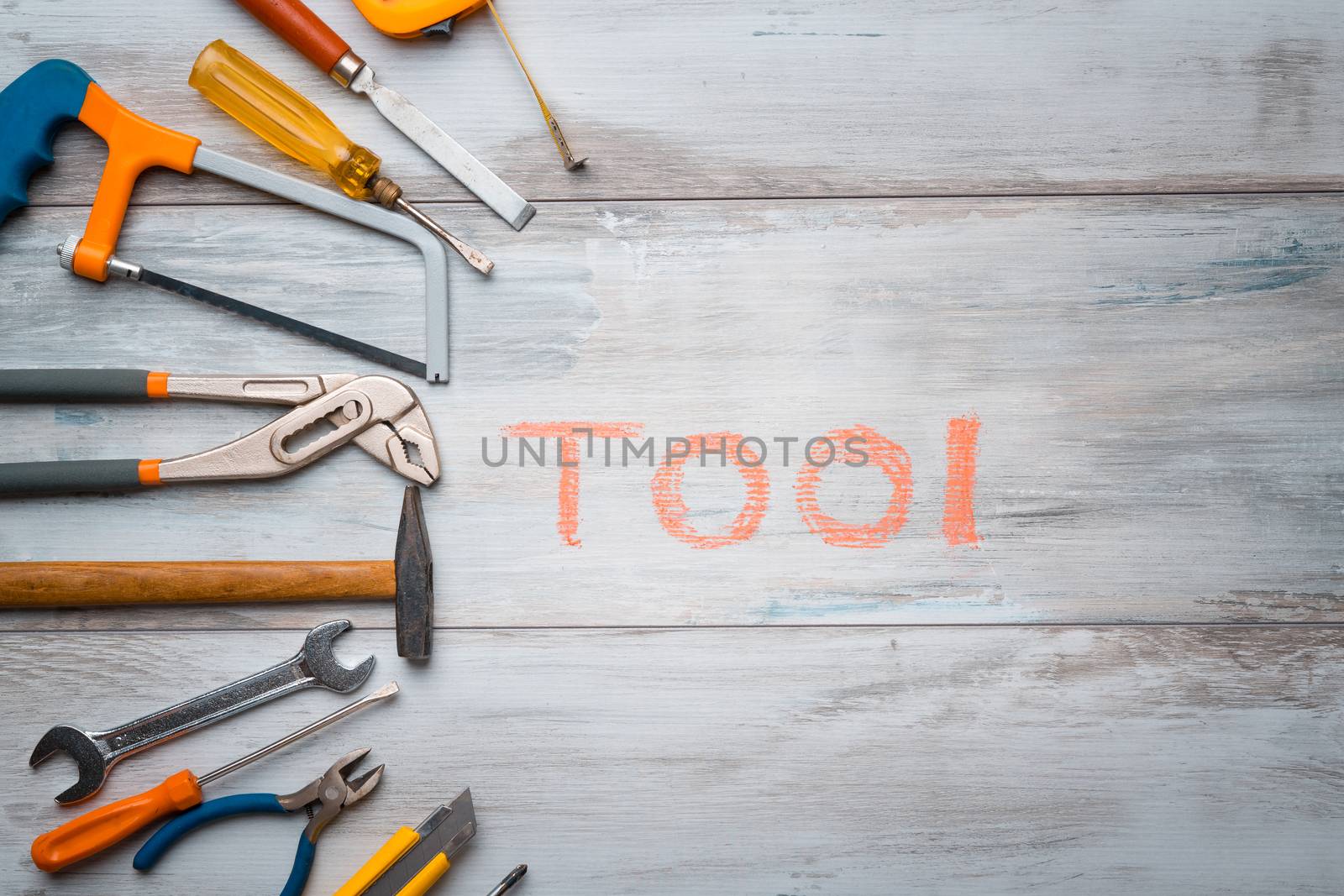 Set of work tool on rustic wooden background with written "tool" in space, industry engineer tool concept.still-life.close up.