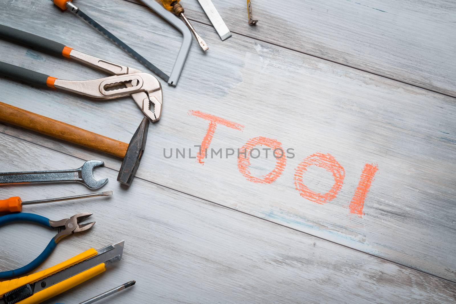 Set of work tool on rustic wooden background with written "tool" in space, industry engineer tool concept.still-life.close up.