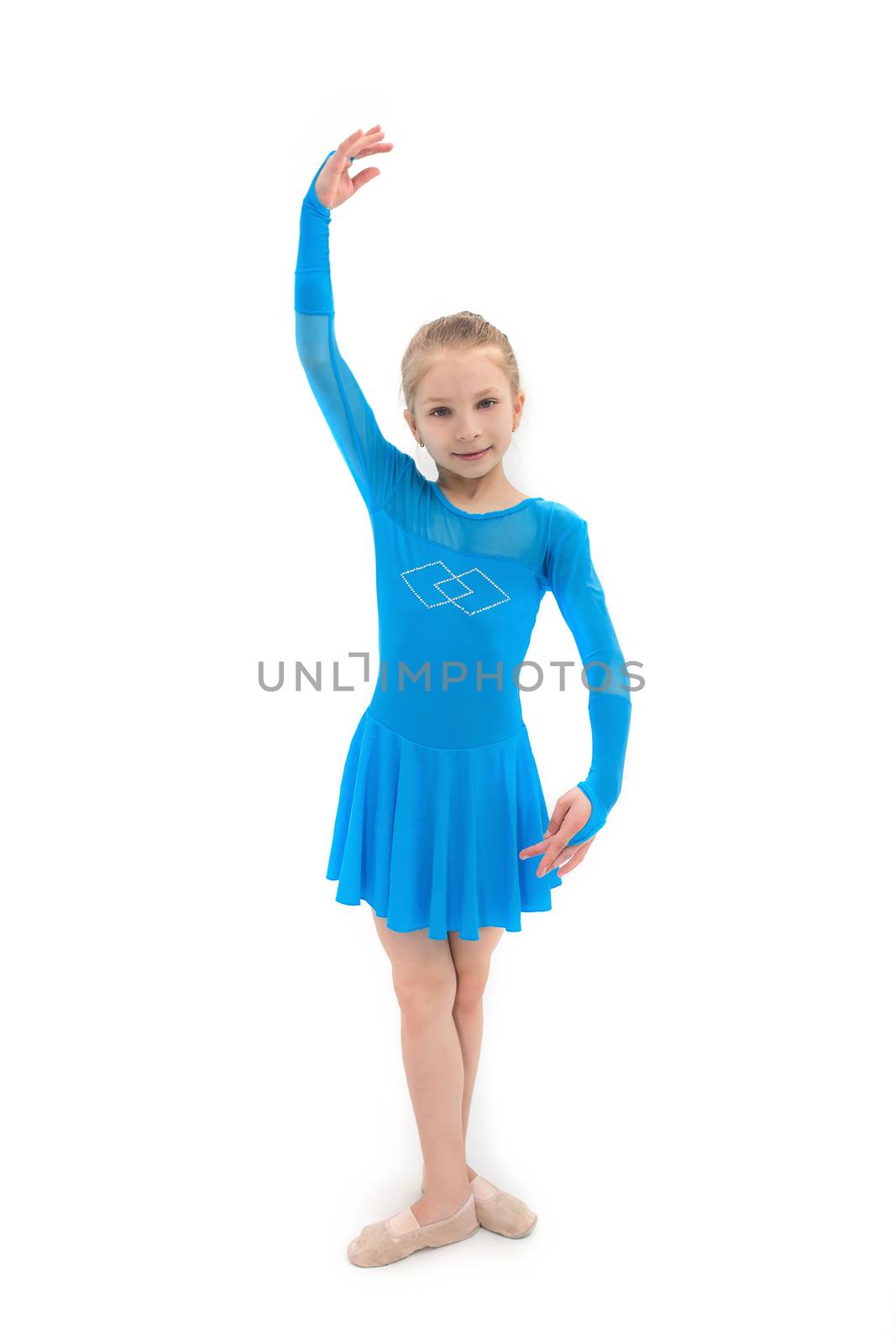 Cute little girl as dancer, studio shot on white background