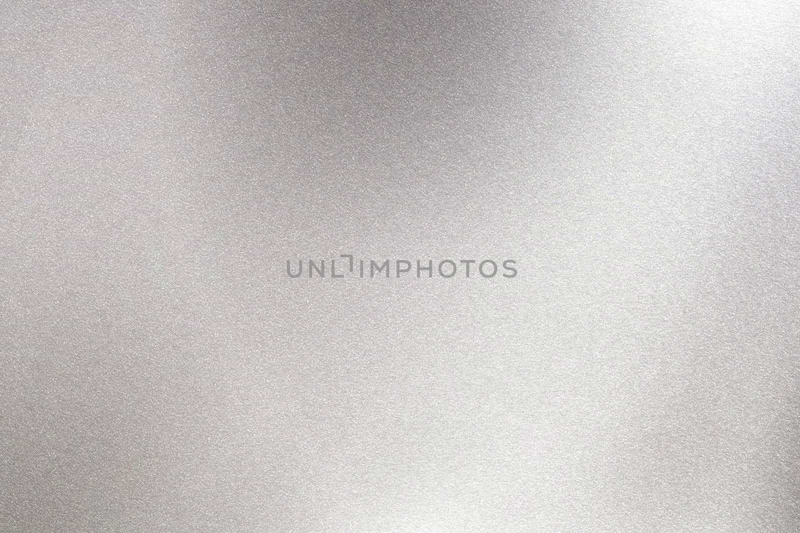 Abstract texture background, light shining on rough stainless steel