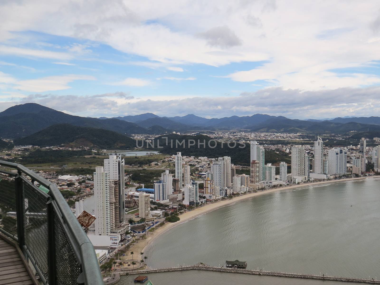 July 09, 2015, Balneario Camboriú, Santa Catarina, Brazil, Panoramic view, from a lookout point, city, sea and mountains, and background with clouds in the sky.