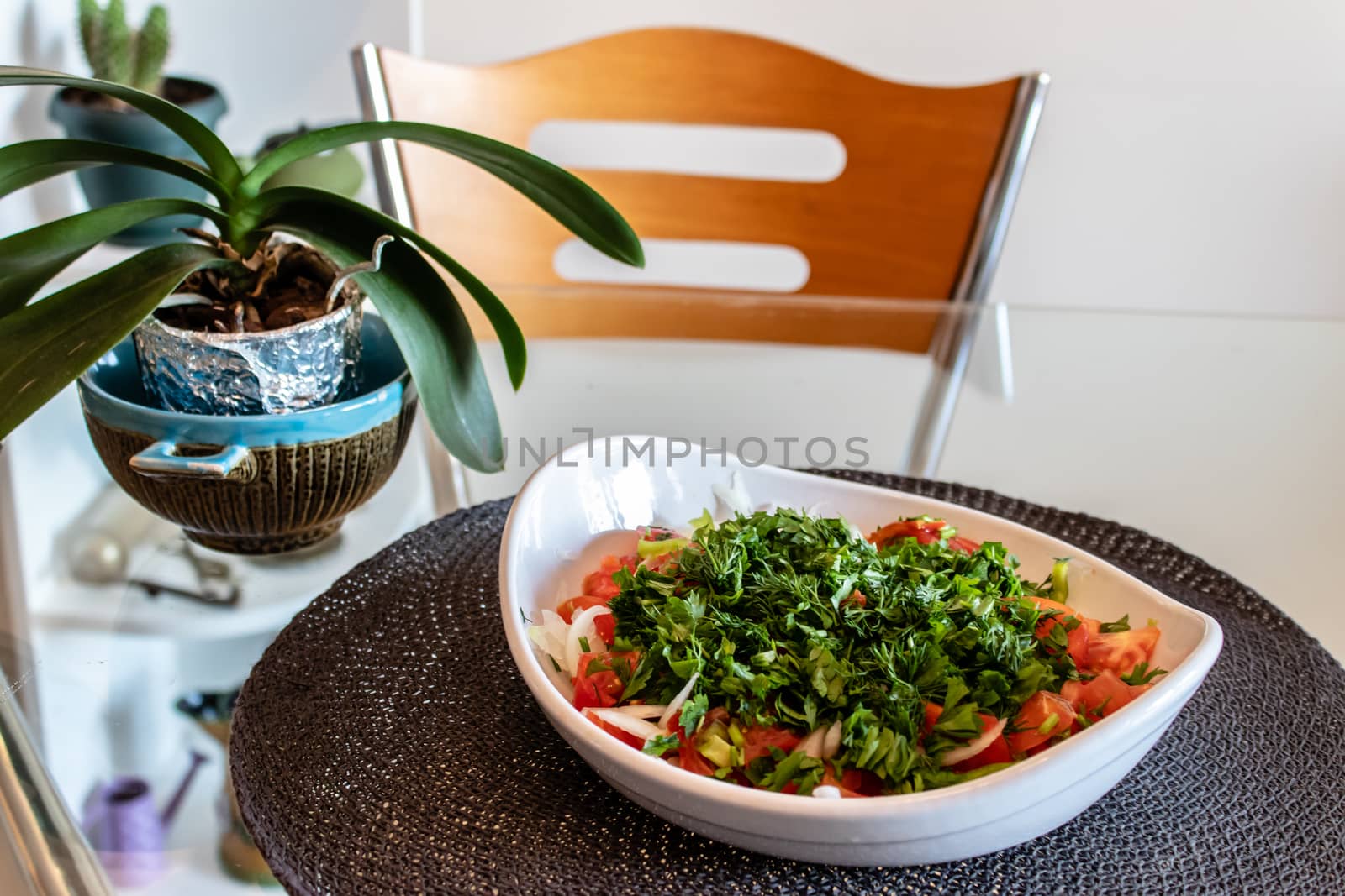 a closeup side view shoot of seasonal salad and flower pot. photo has taken from aydin/turkey.