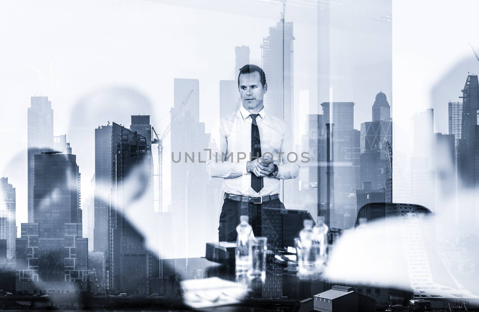 Corporate business, economic development or real estate company concept. Confident company leader on business meeting against new york city manhattan buildings and skyscrapers window reflections.