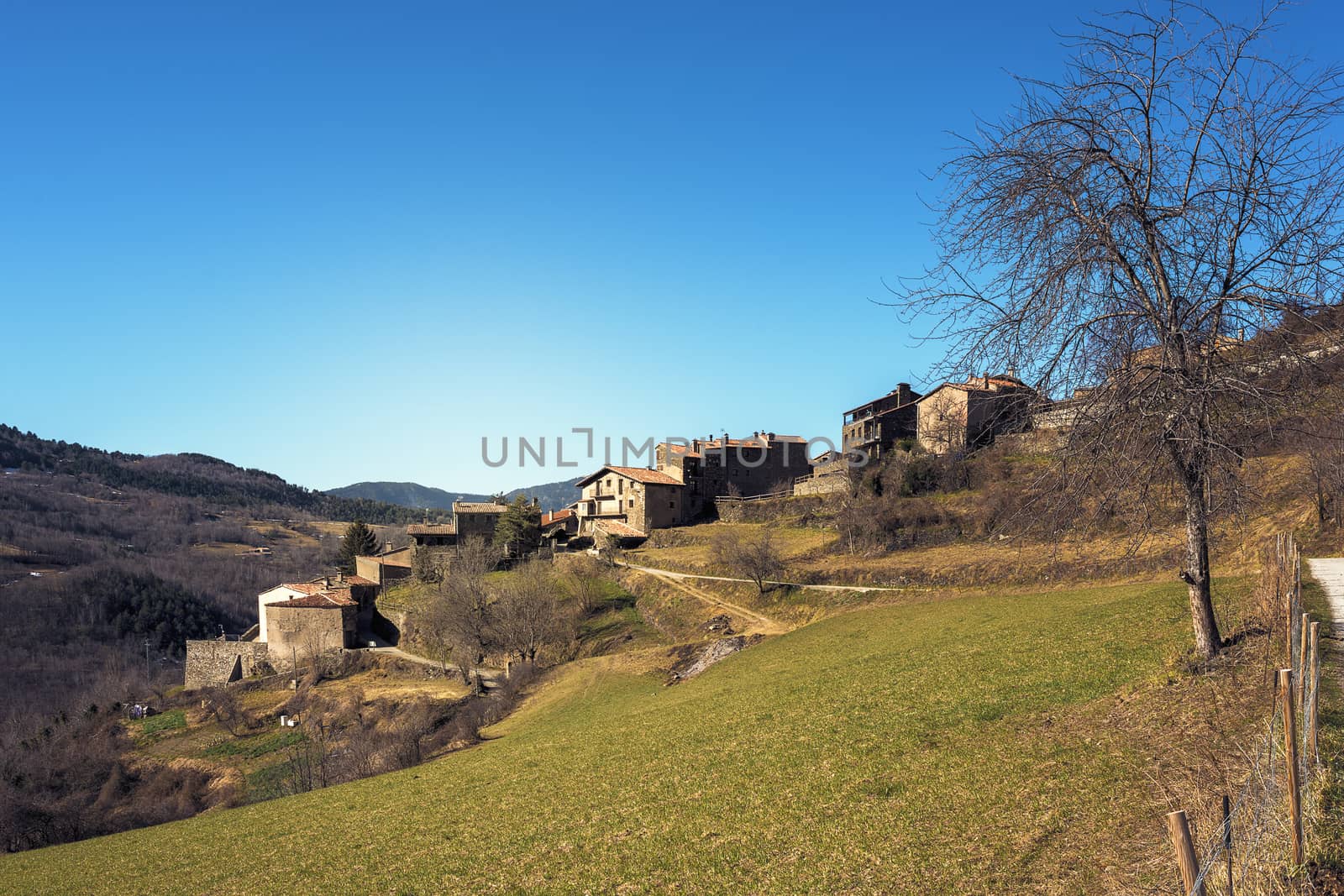 ancient village on the slope of the valley with blue clear sky, copy space for text
