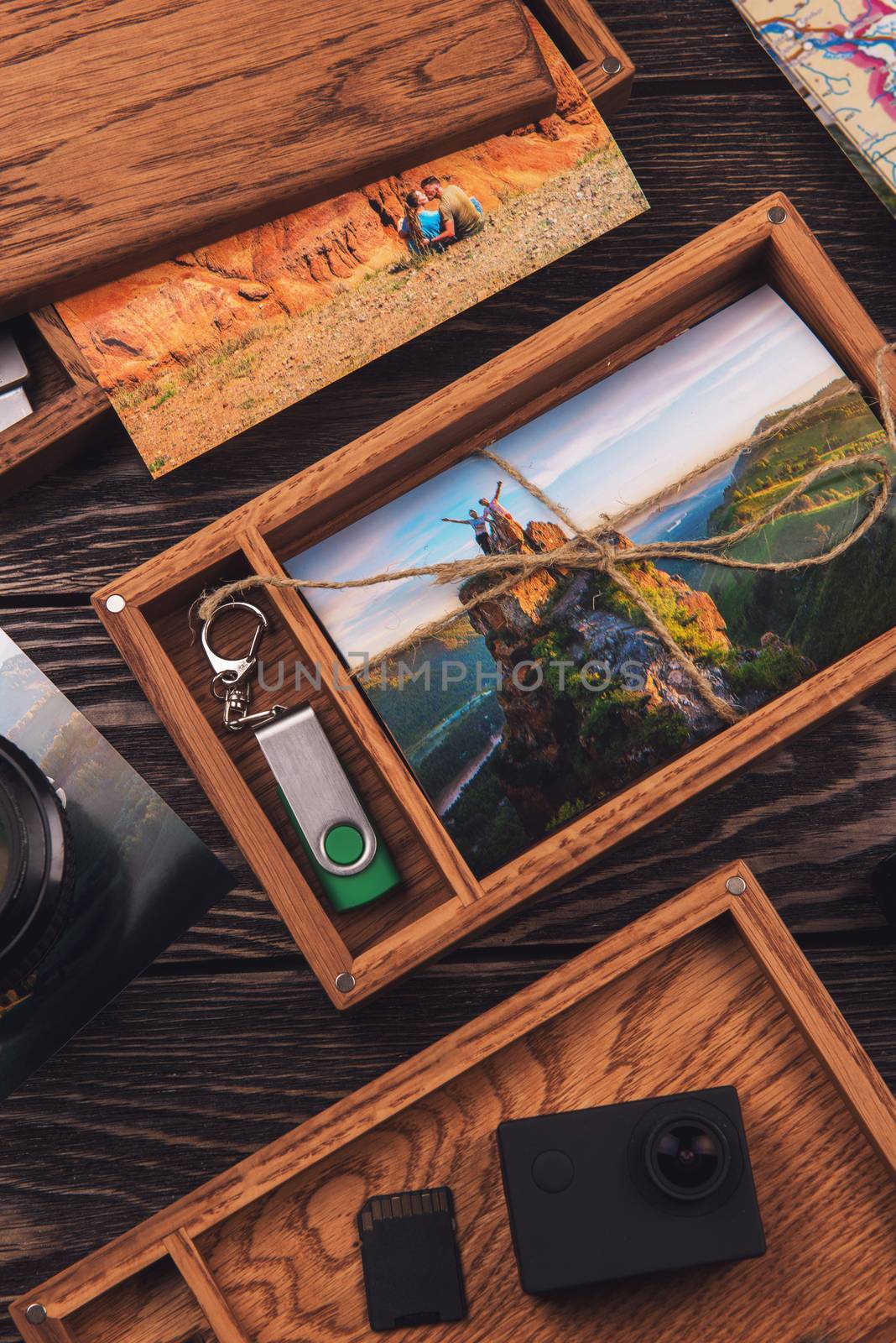 Wooden photo box with photo from travel. Decorated with different things. Travel concept.