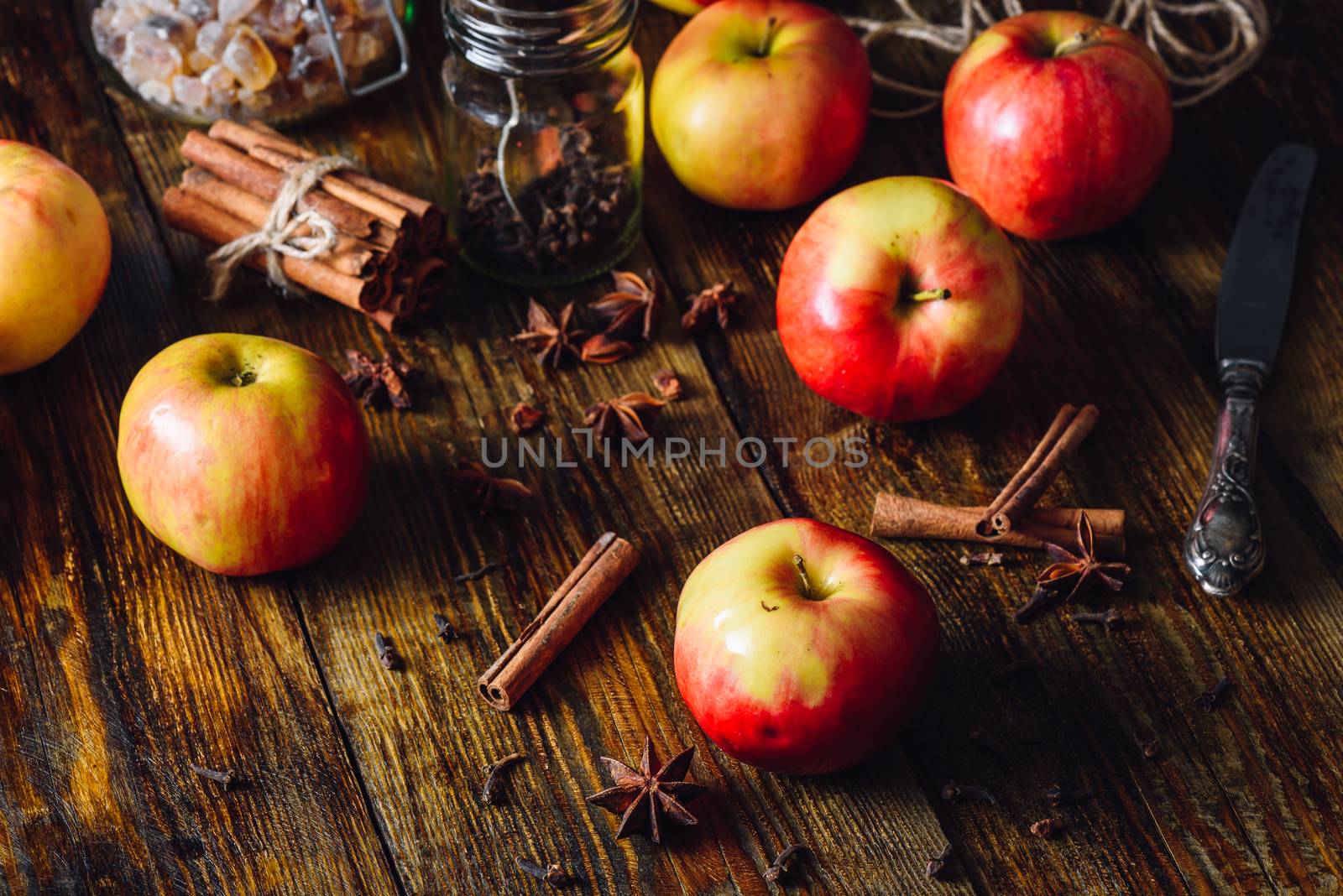 Red Apples with Different Spices for Cooking Apple Pie.