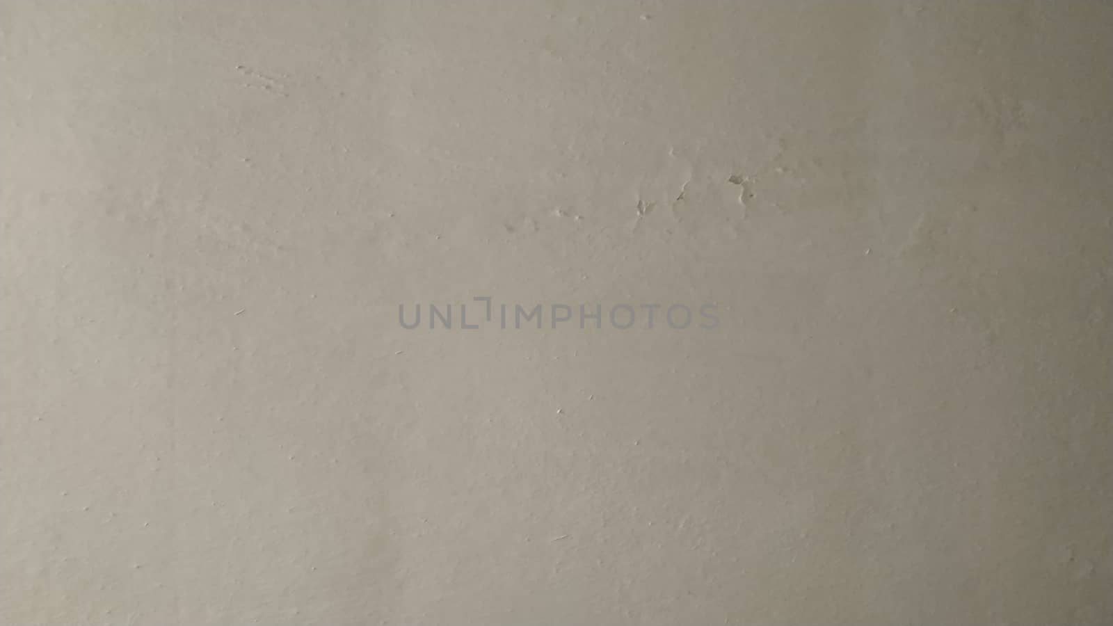 Fragment of the wall, painted white. Background