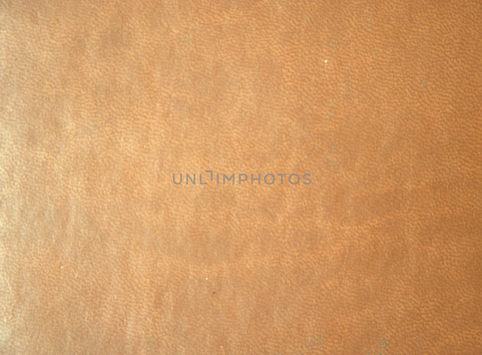 Genuine brown leather. Background. Texture. Close-up.