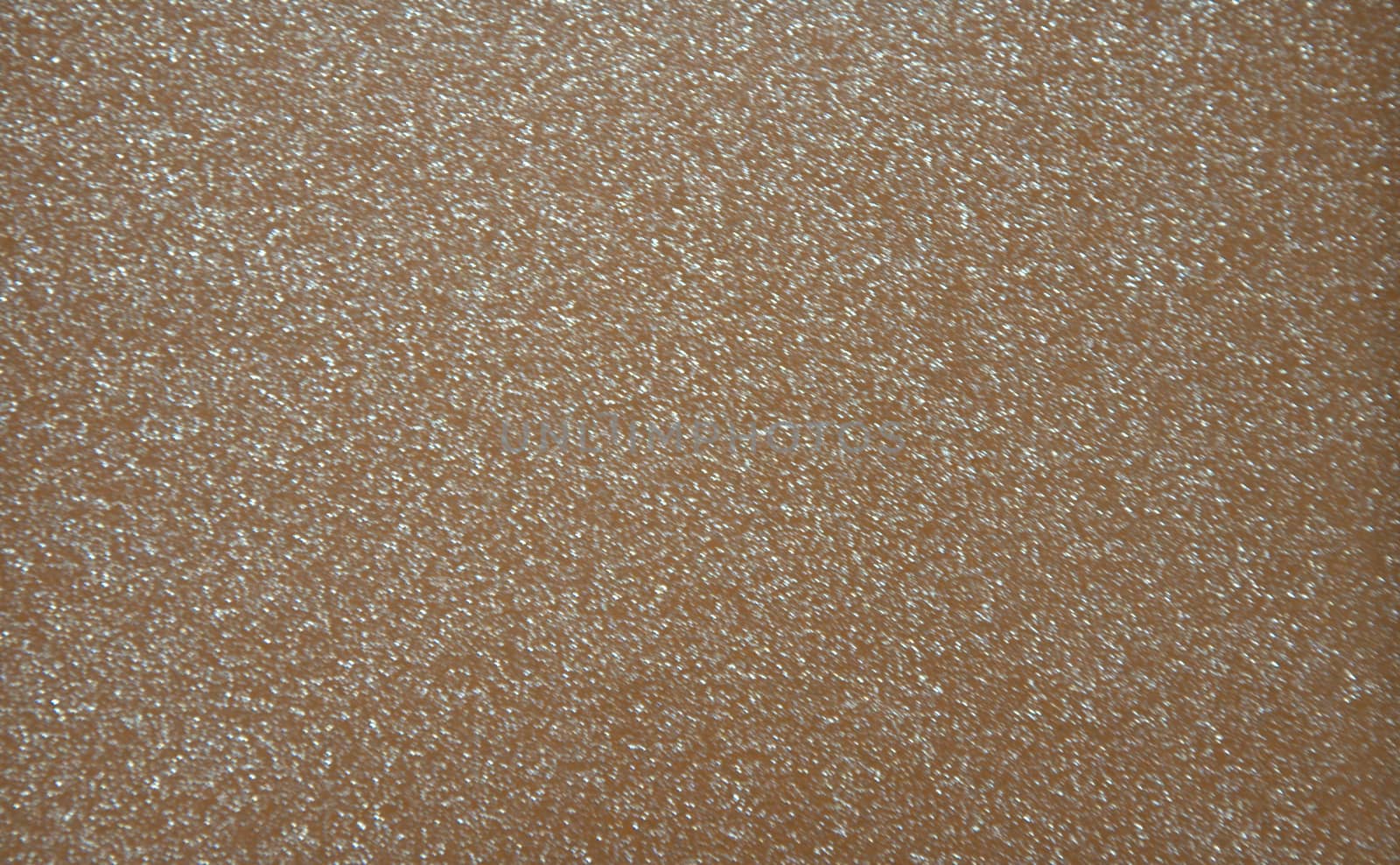 Brown pearlescent transparent background with metal splashes. Background. Texture.
