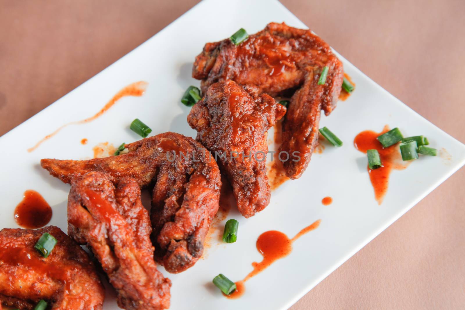 Chicken Wings Chipotle Flavour Closeup by haiderazim