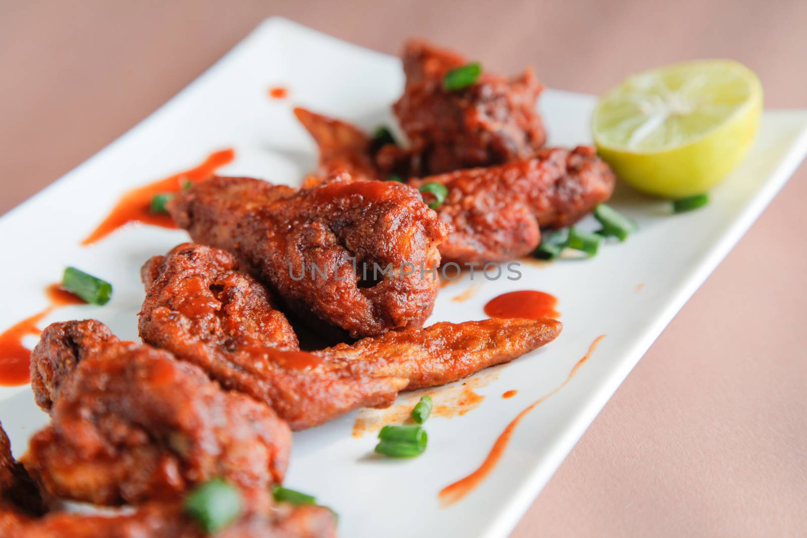 Chipotle Chicken Wings Closeup by haiderazim