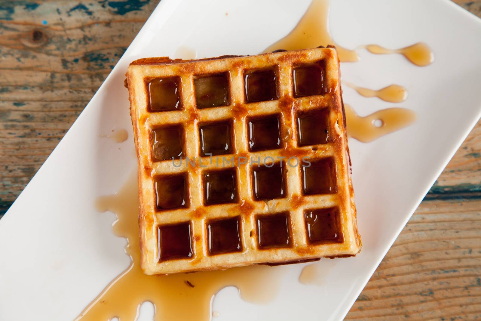 Maple syrup waffle top angle by haiderazim