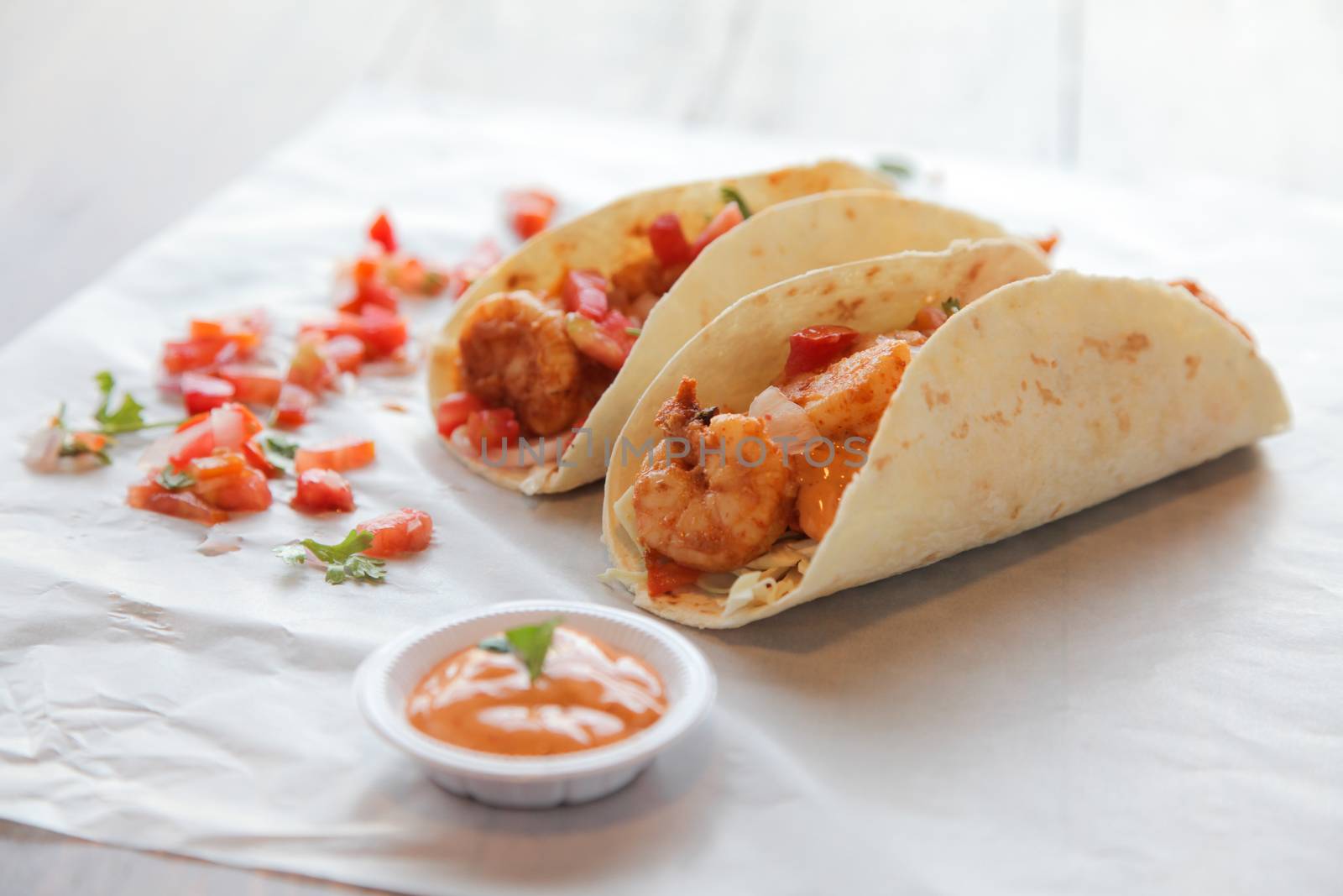 Prawn tacos seafood with condiments