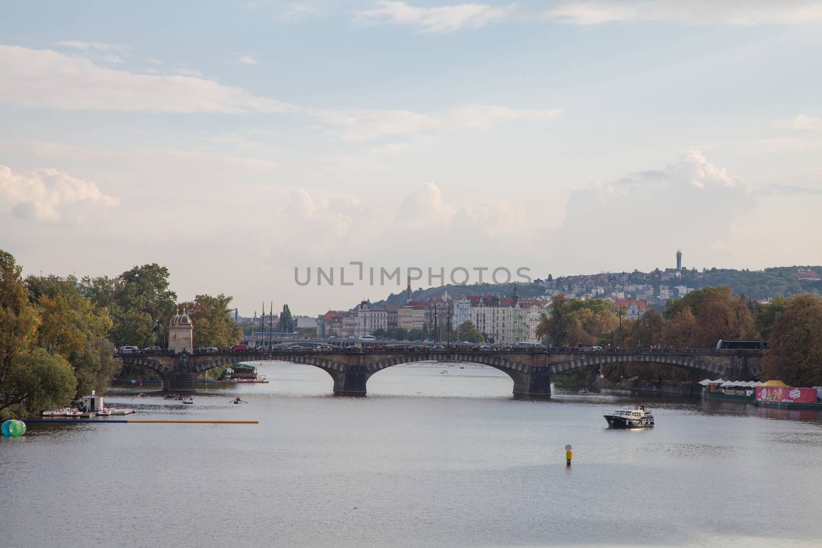 Charles Bridge historic bridge crosses the Vltava river in Pragu by haiderazim