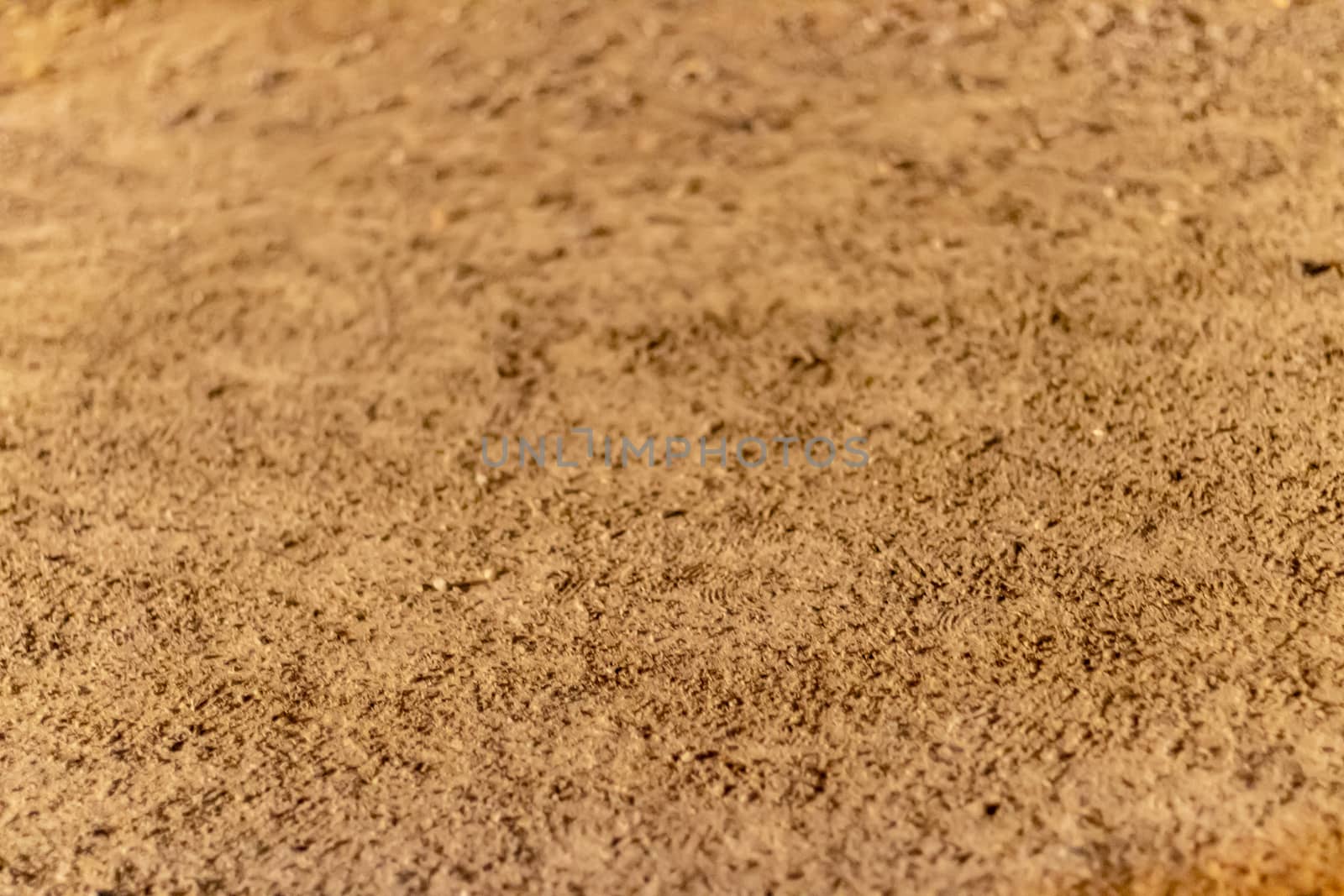 a closeup texture shoot to granular sand. photo has taken at izmir/turkey.