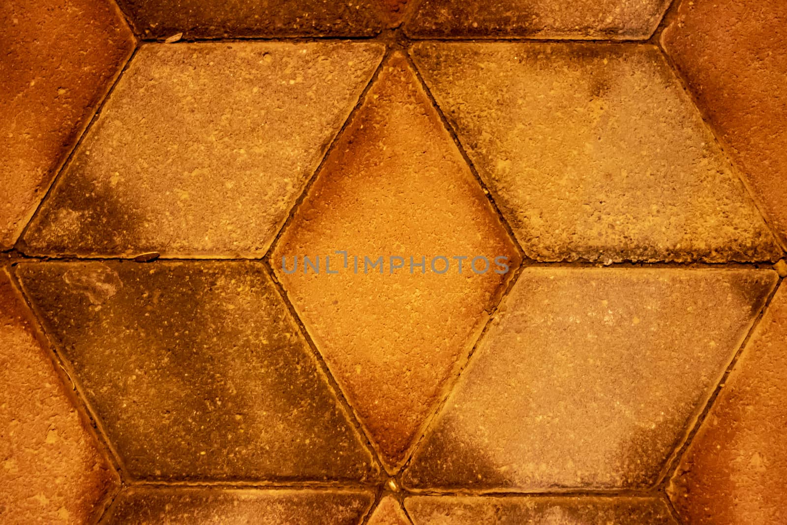 a good looking yellow old cobblestone - geometric shape. photo has taken at a street in izmir/turkey.