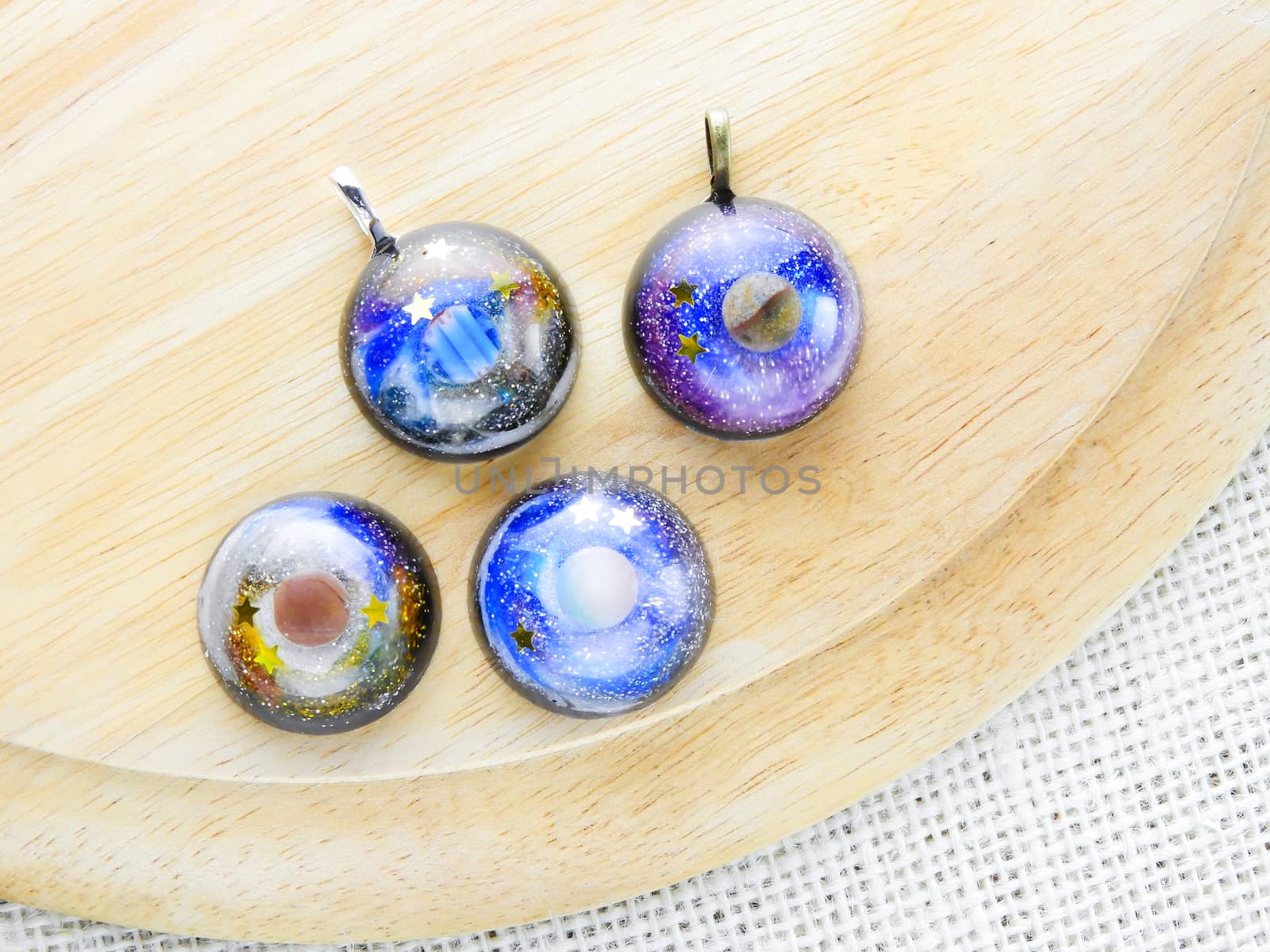 Create galaxy drink coasters using resin, glitter and pigment powders, handmade items. Suitable for keychains, necklace and pendant.