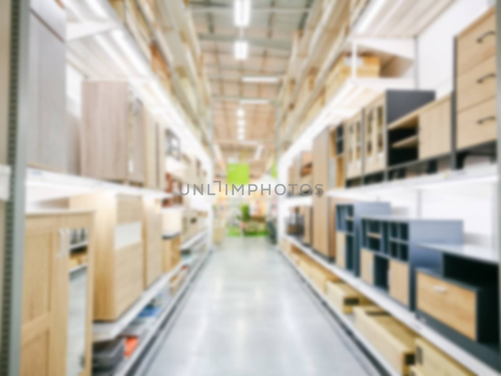 Blur furniture store interior for background. blurry industrial furniture merchandise inventory and wood material.
