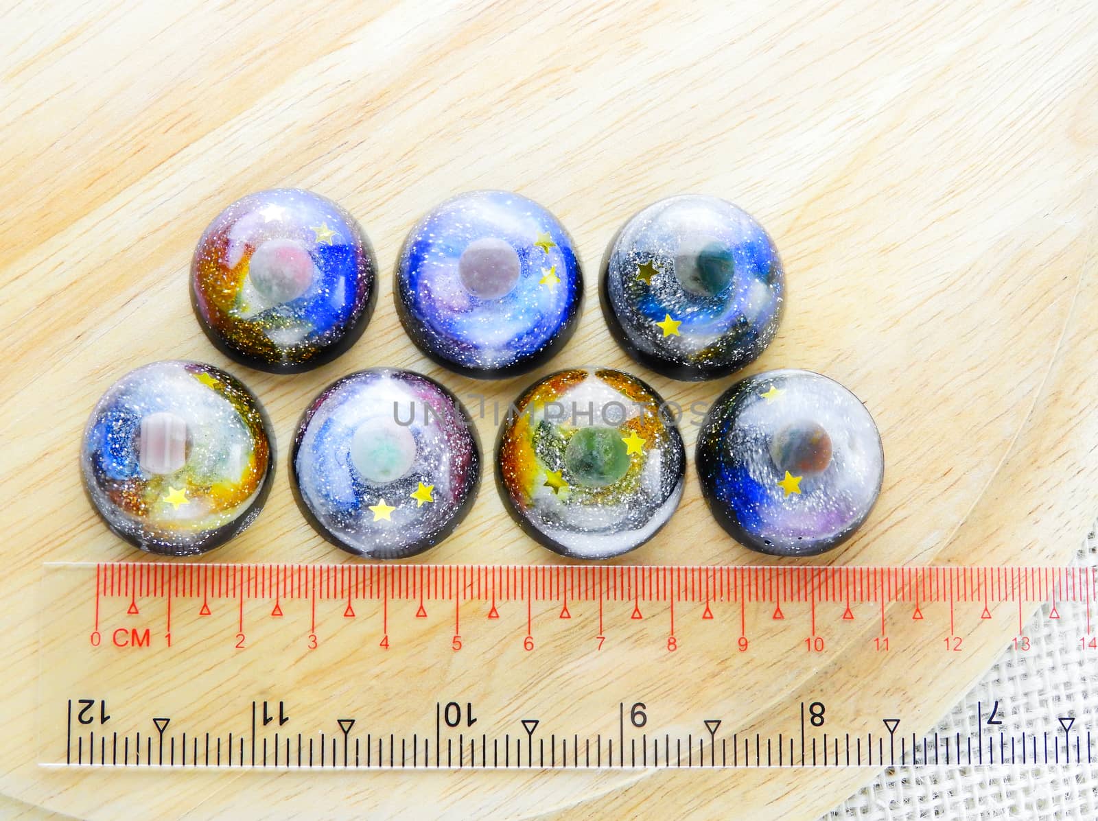 Create galaxy drink coasters using resin, glitter and pigment powders, handmade items. Suitable for keychains, necklace and pendant.