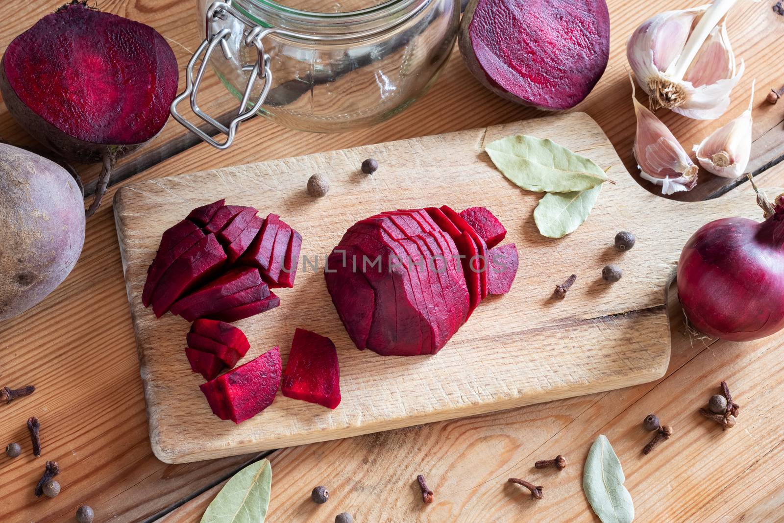 Sliced red beets with garlic and spices - ingredients to prepare fermented kvass
