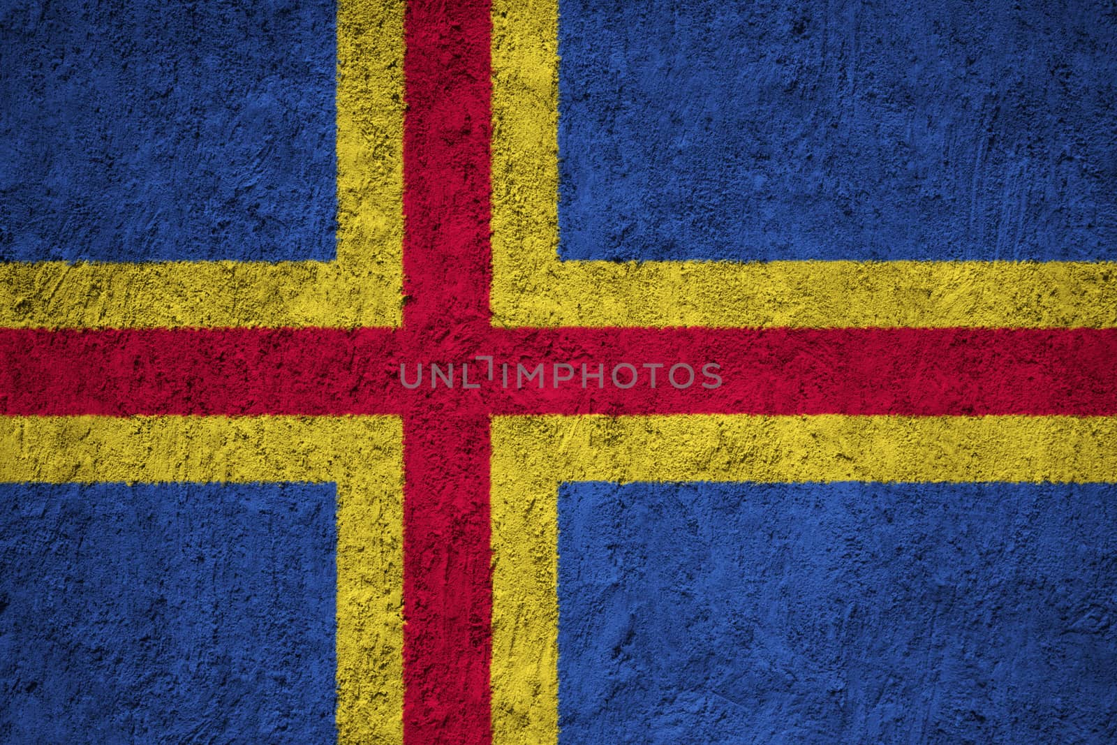 Aland flag painted on the cracked grunge concrete wall