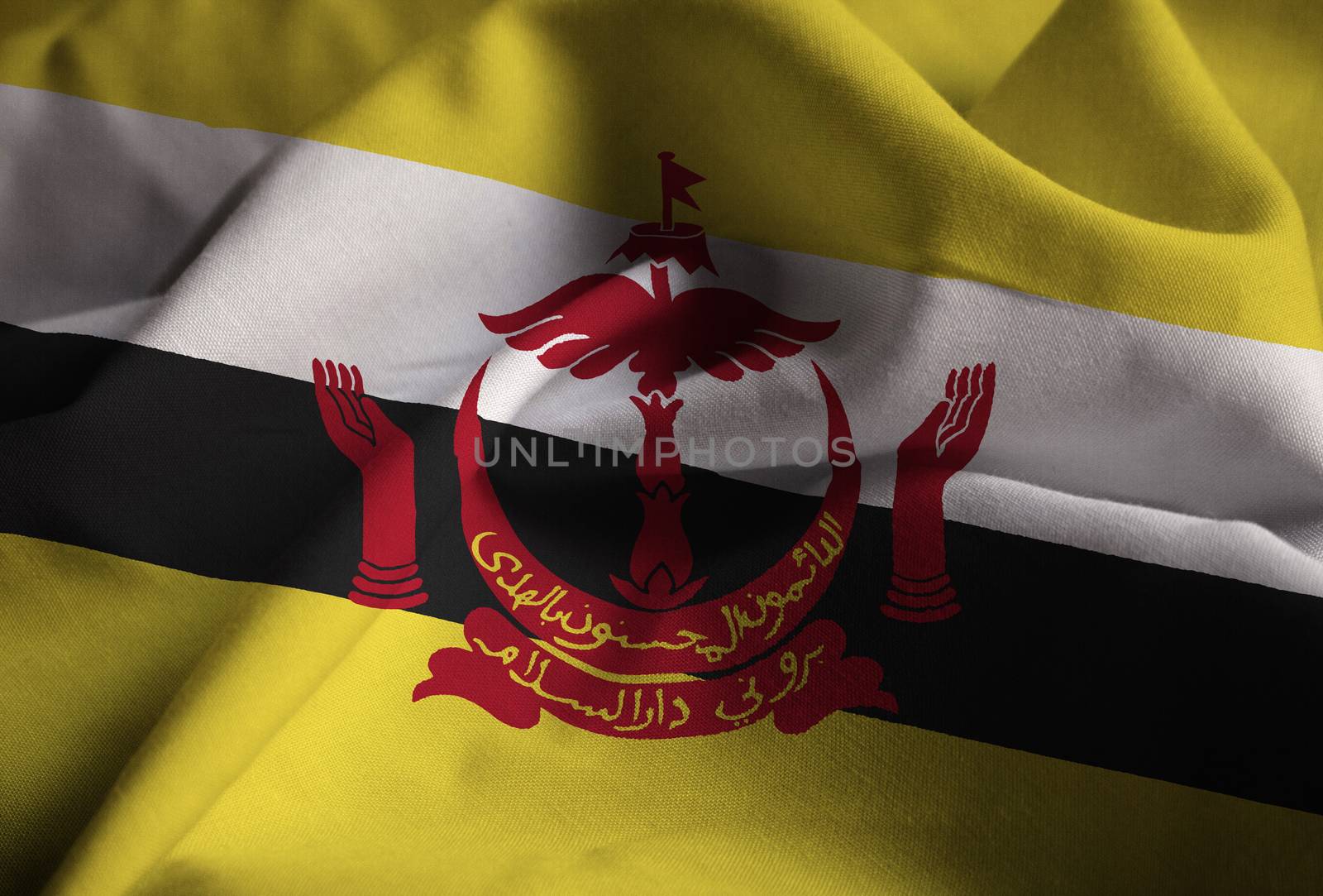 Ruffled Flag of Brunei Blowing in Wind