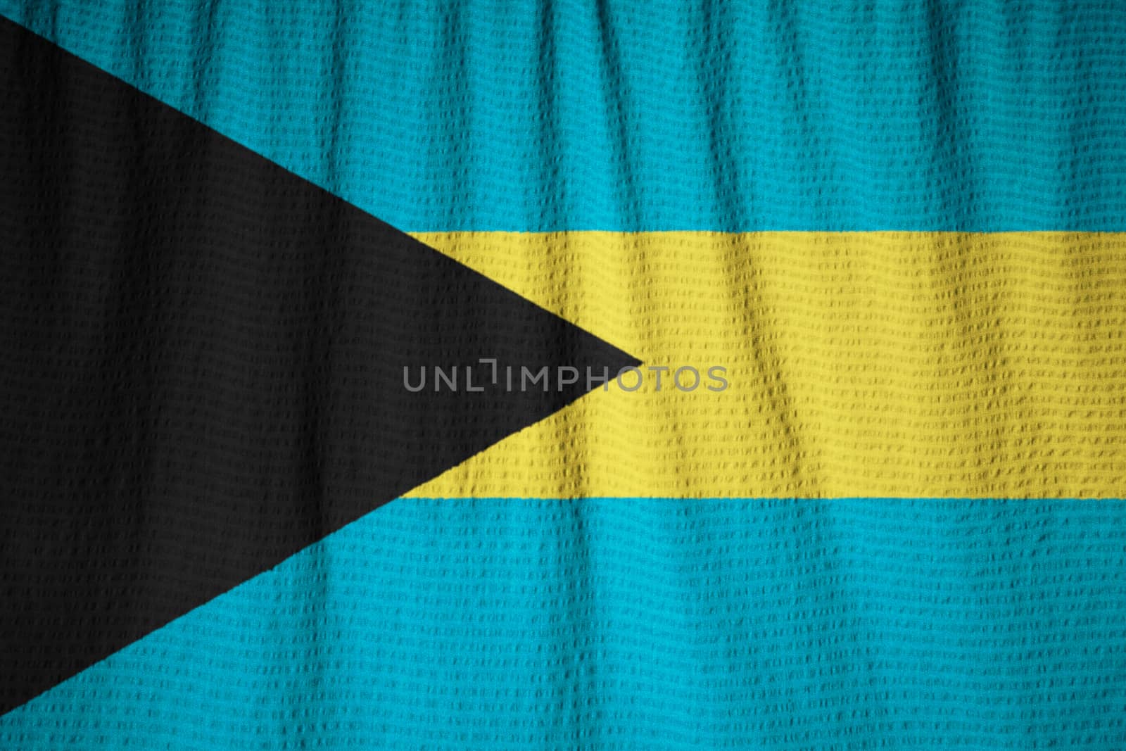 Ruffled Flag of Bahamas Blowing in Wind