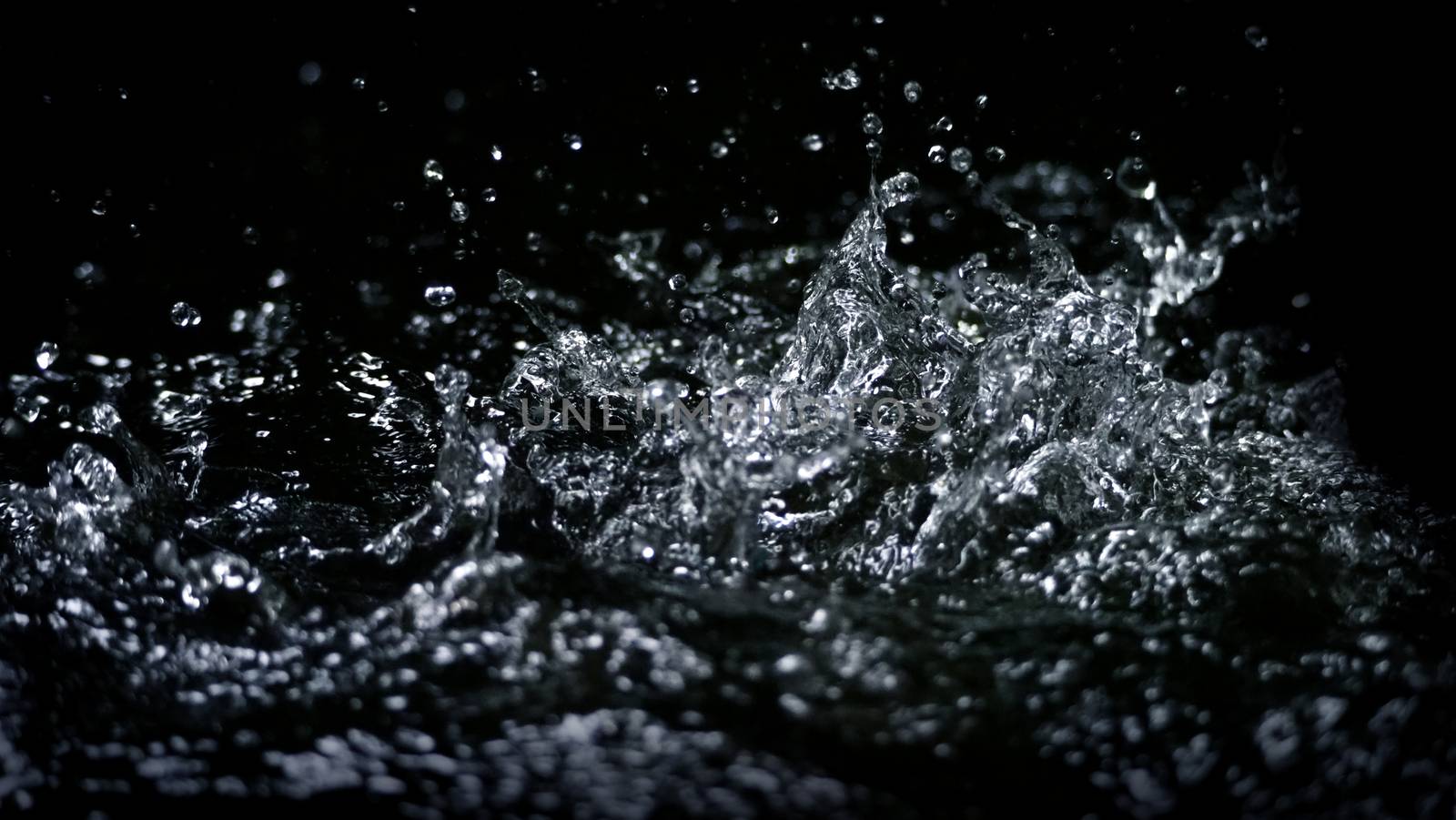 Blurry images of drinking water liquid wave splashing by gnepphoto