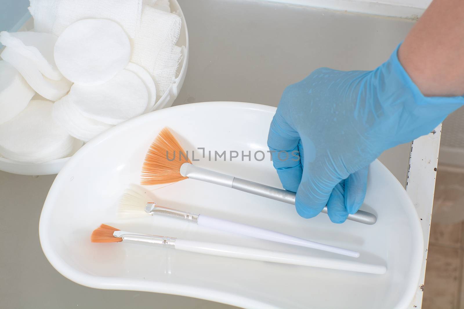 Close-up view of the cosmetic brushes for peeling and facial cleansing. Medical and beauty equipment healthcare. Modern medical and beauty technology concept. 