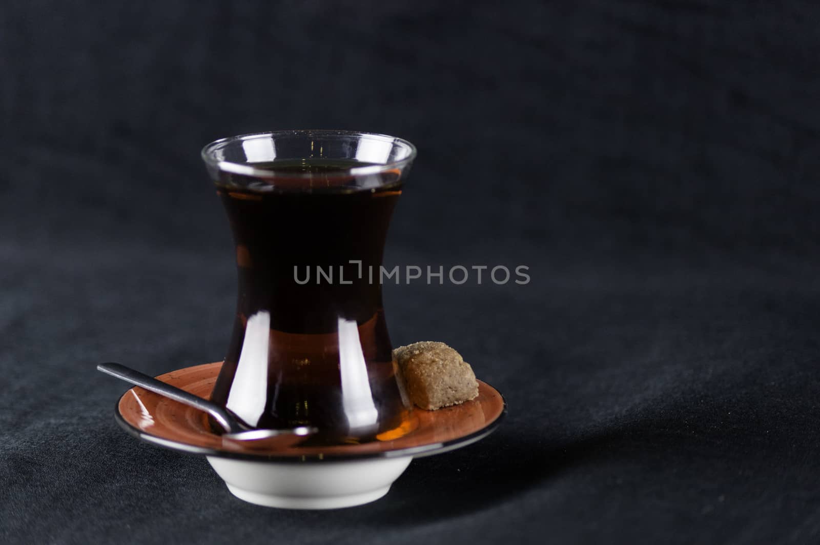 a cup of tea lit by artificial light