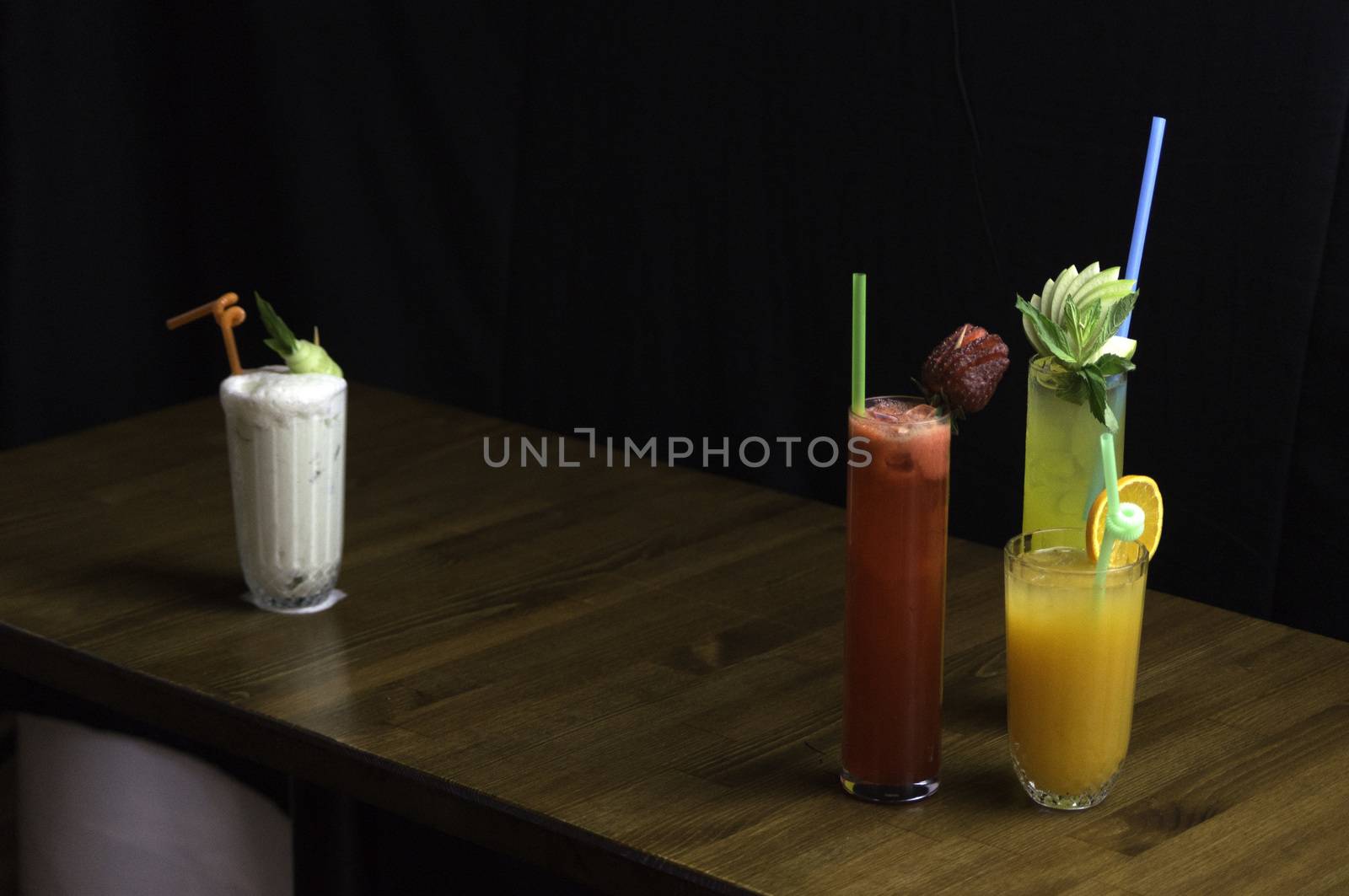 drinks of different colors and flavors pipette by sonyugur