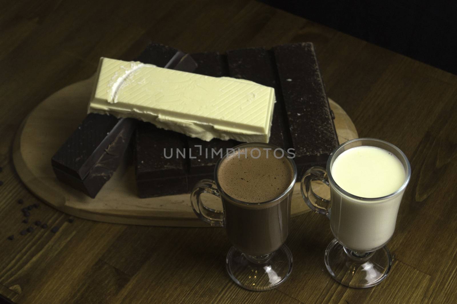 molded chocolates with exotic drinks with milk and chocolate