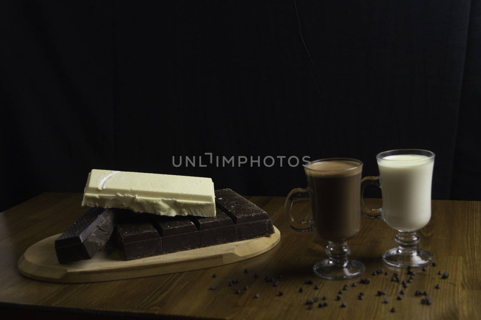 molded chocolates with exotic drinks with milk and chocolate