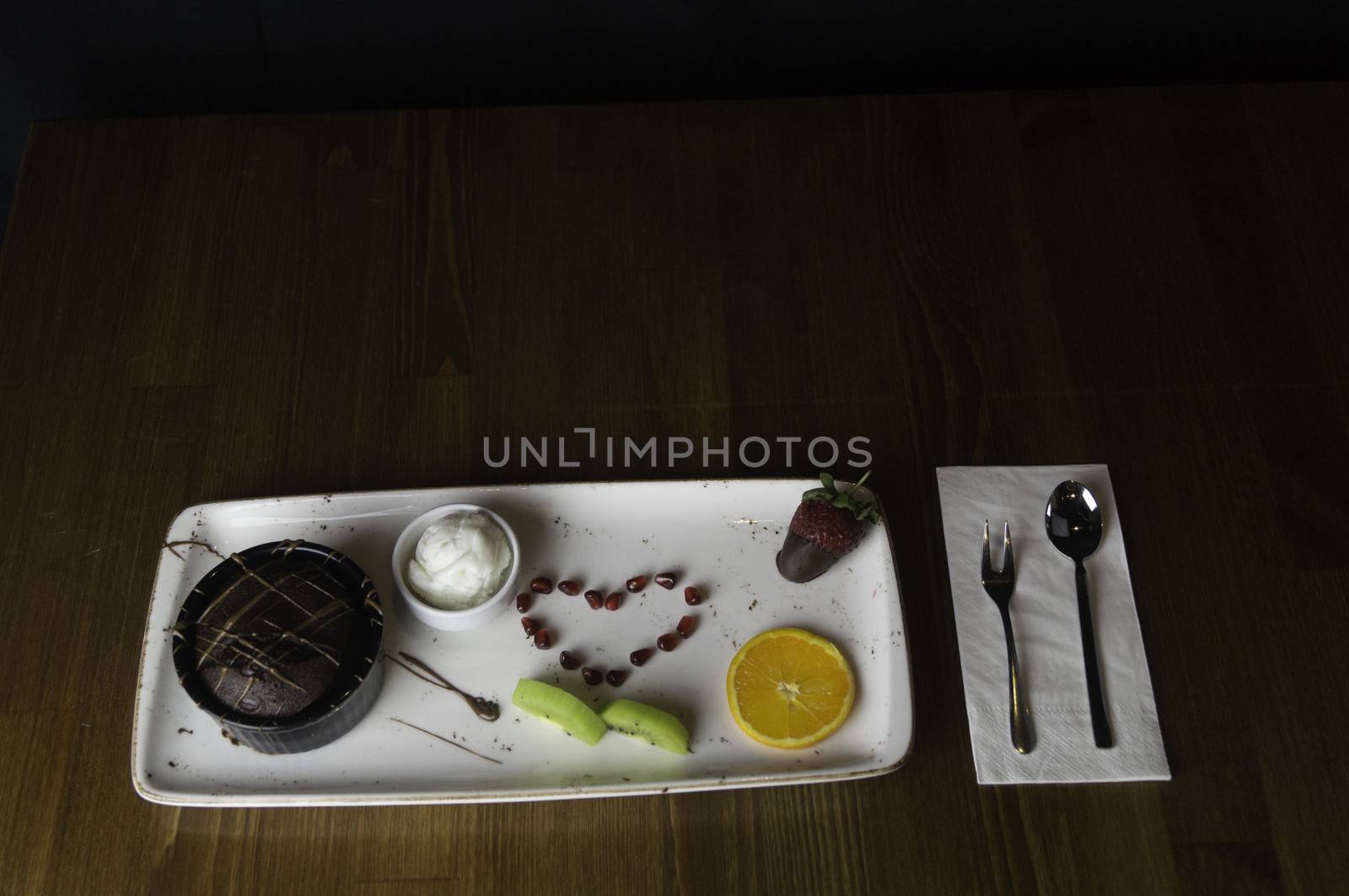 In carefully crafted serving tray cake and sweets