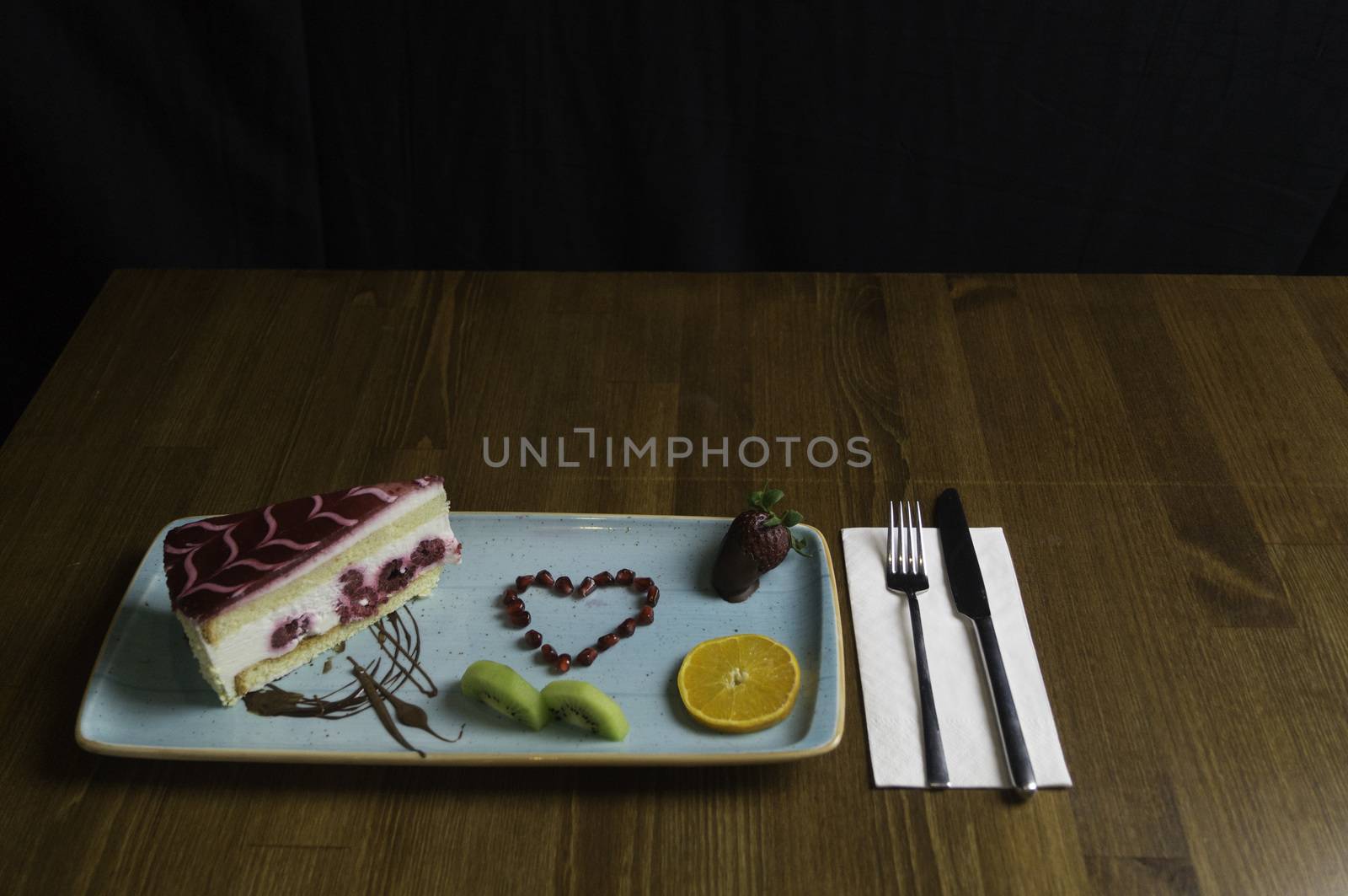 In carefully crafted serving tray cake and sweets
