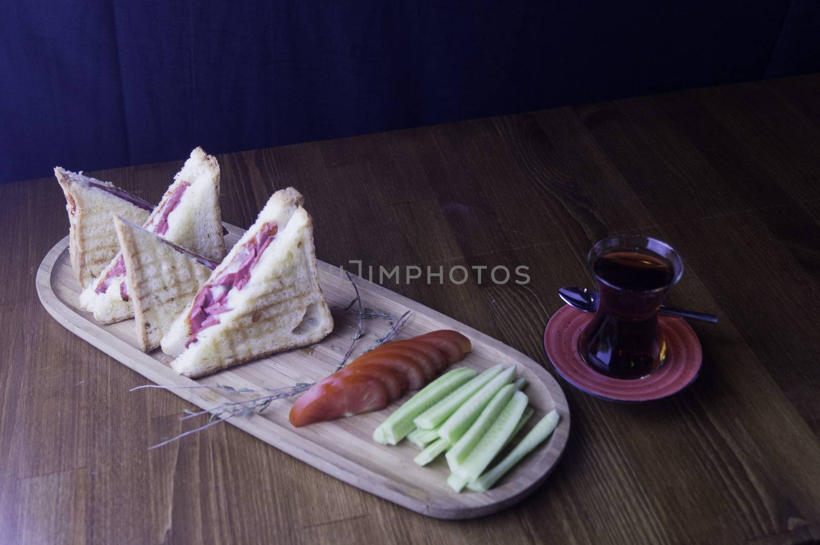 sliced cheddar and hot dog toast for breakfast by sonyugur