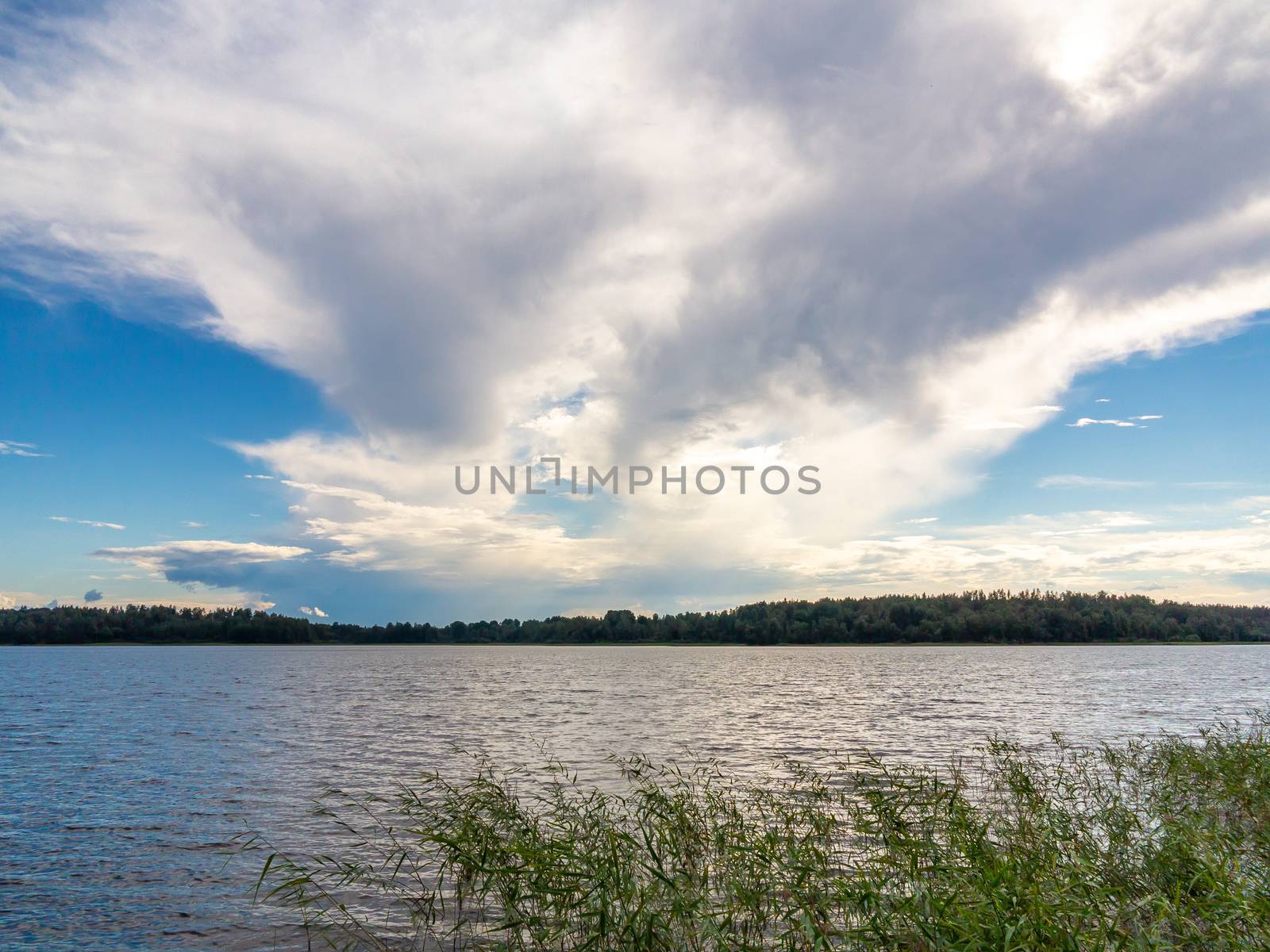 Beautiful clouds in the blue sky over the lake by galsand