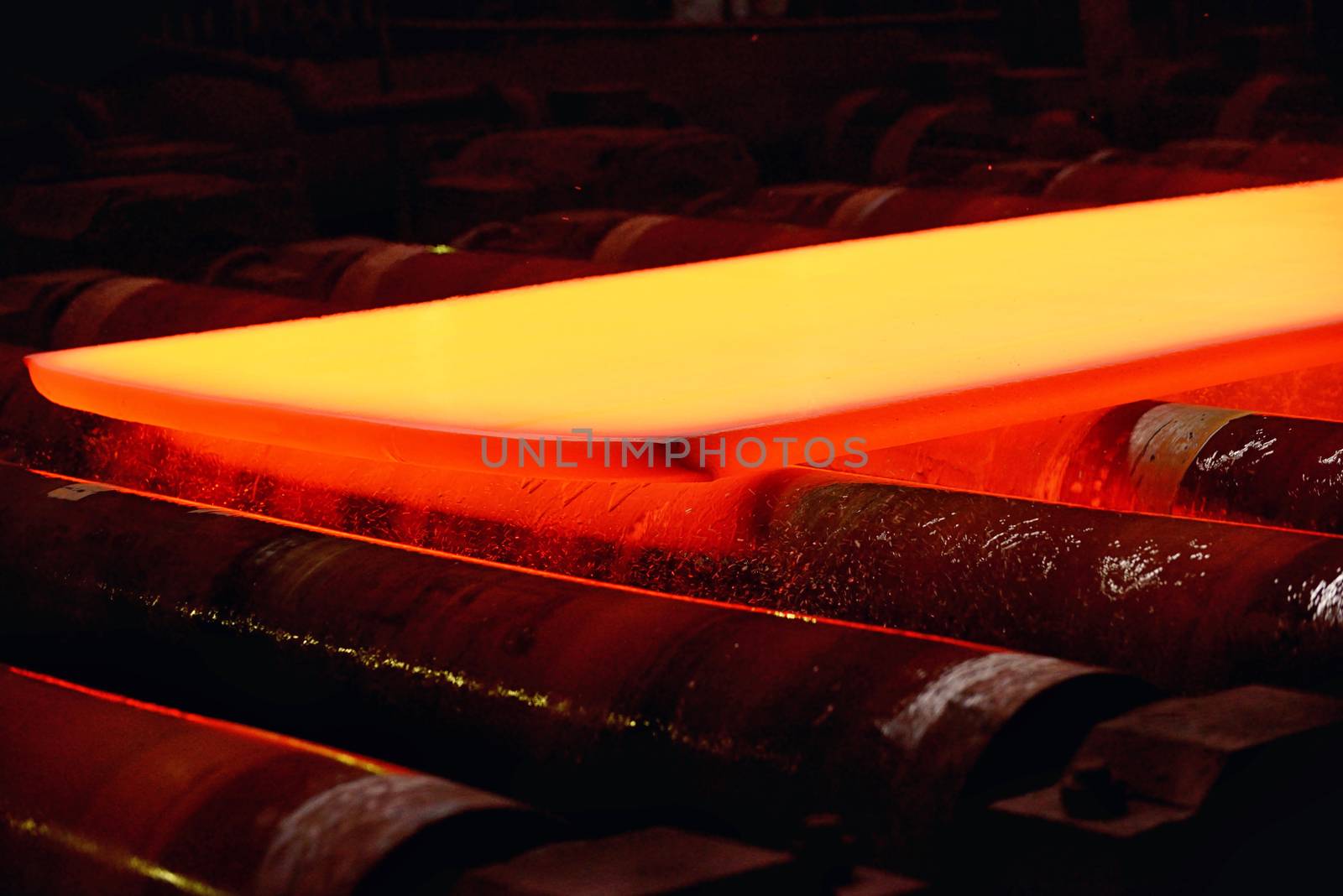 Industrial hot steel coil on conveyor