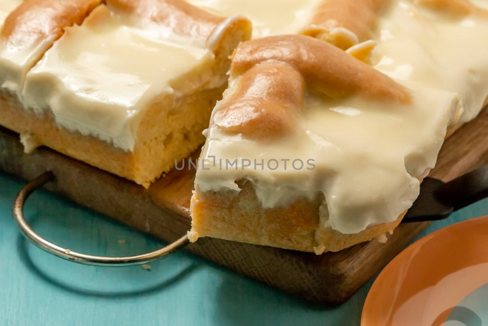 Sliced Apple Pie with Sour Cream on Wooden Cutting Board - photo, image.