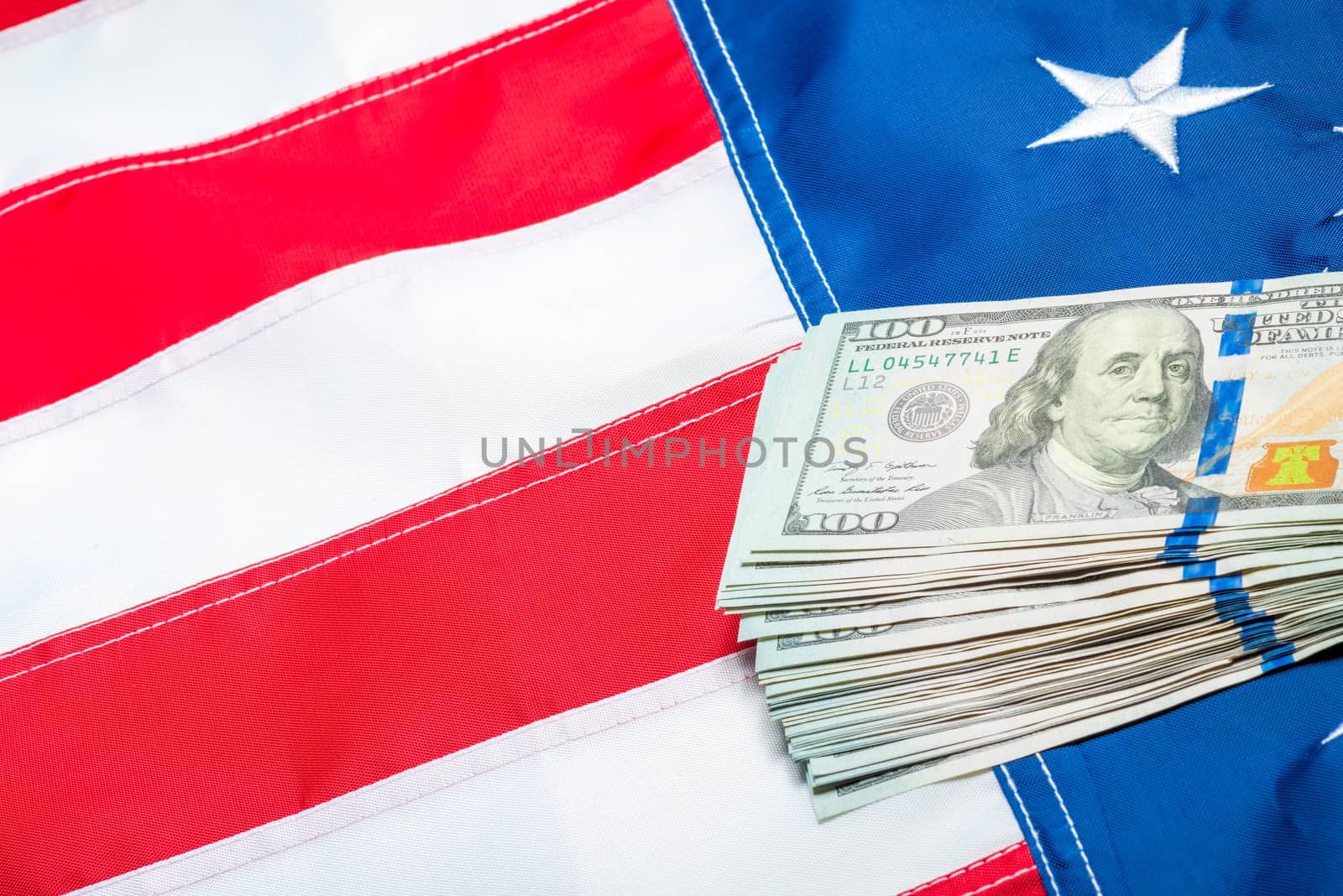 a lot of money on the flag of america, close-up shot