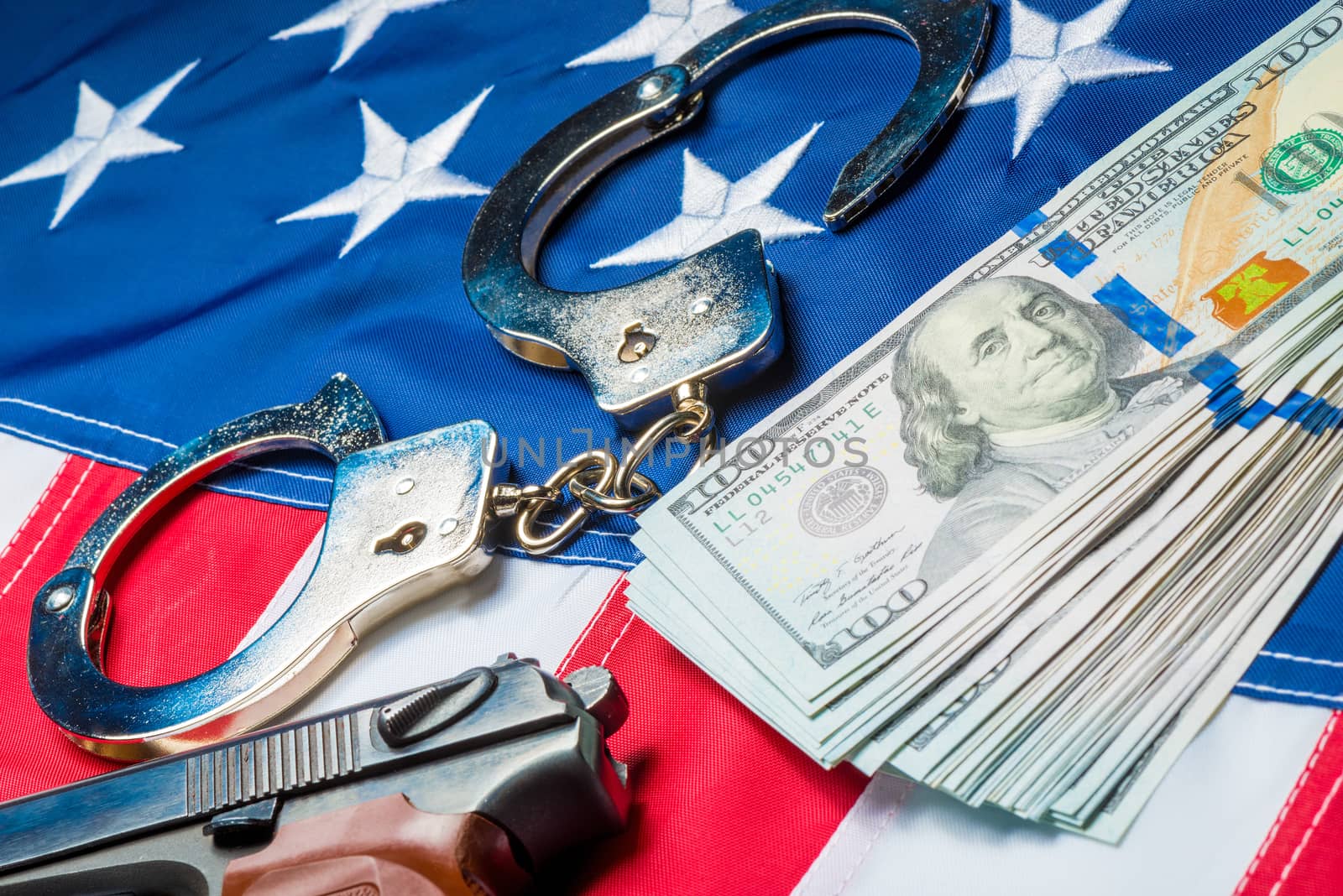 Money laundering concept photo crime and punishment, dollars and american flag